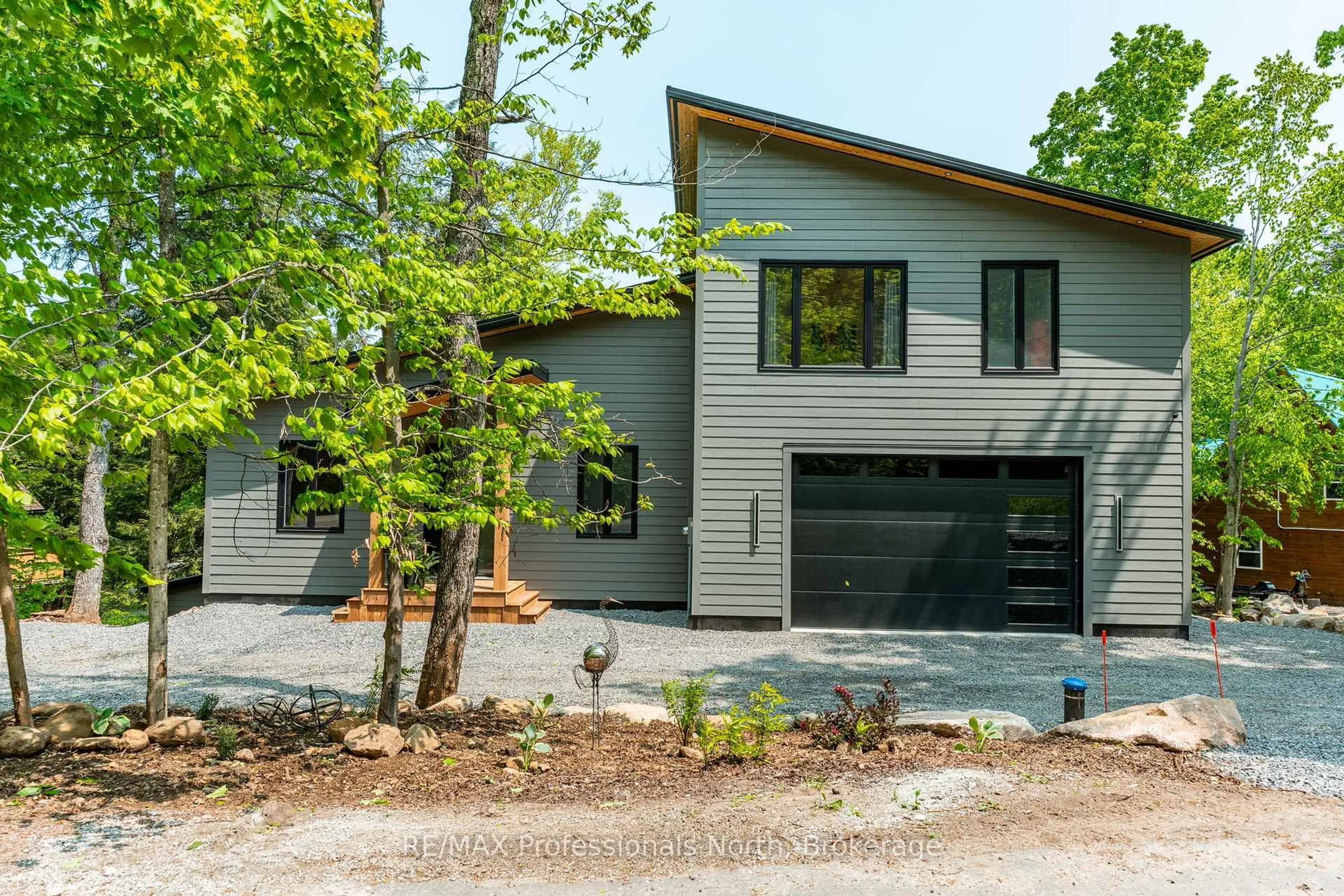 Home with vinyl exterior material, street for 1063 Mink Rd, Dysart et al Ontario K0M 1S0