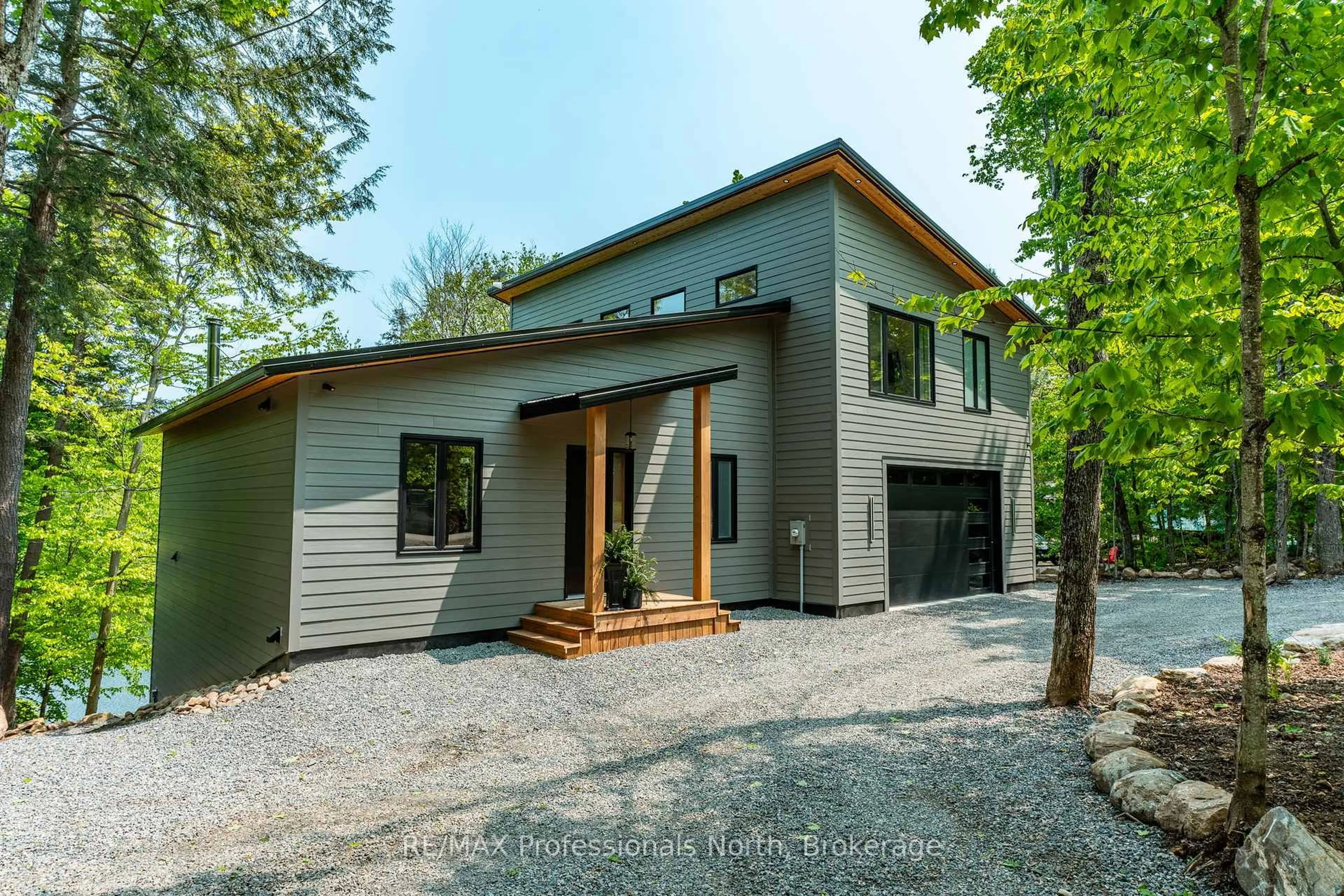 Home with brick exterior material, street for 1063 Mink Rd, Dysart et al Ontario K0M 1S0
