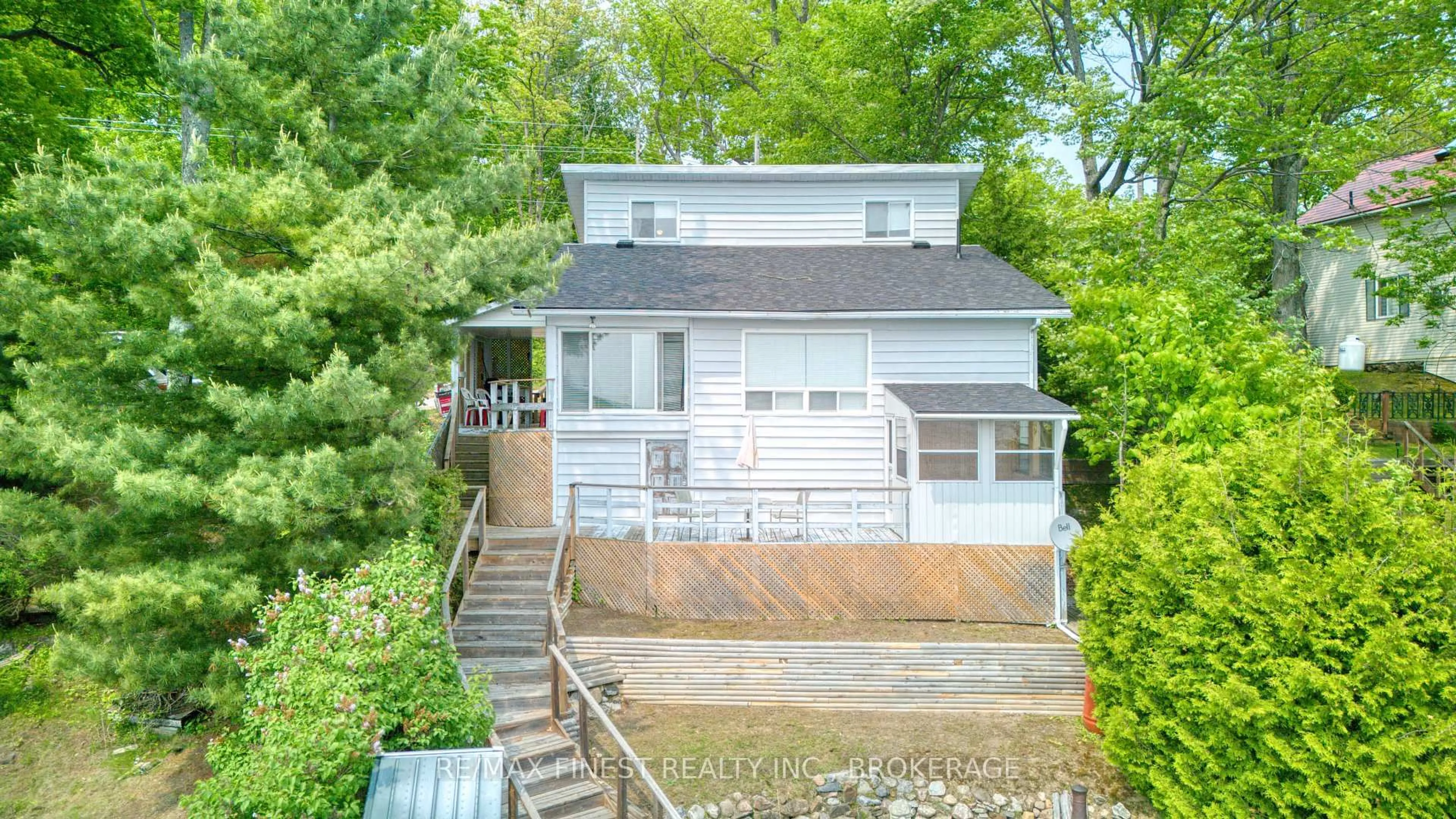 A pic from outside/outdoor area/front of a property/back of a property/a pic from drone, water/lake/river/ocean view for 1981 Crow Lake Rd, Maberly Ontario K0H 2B0