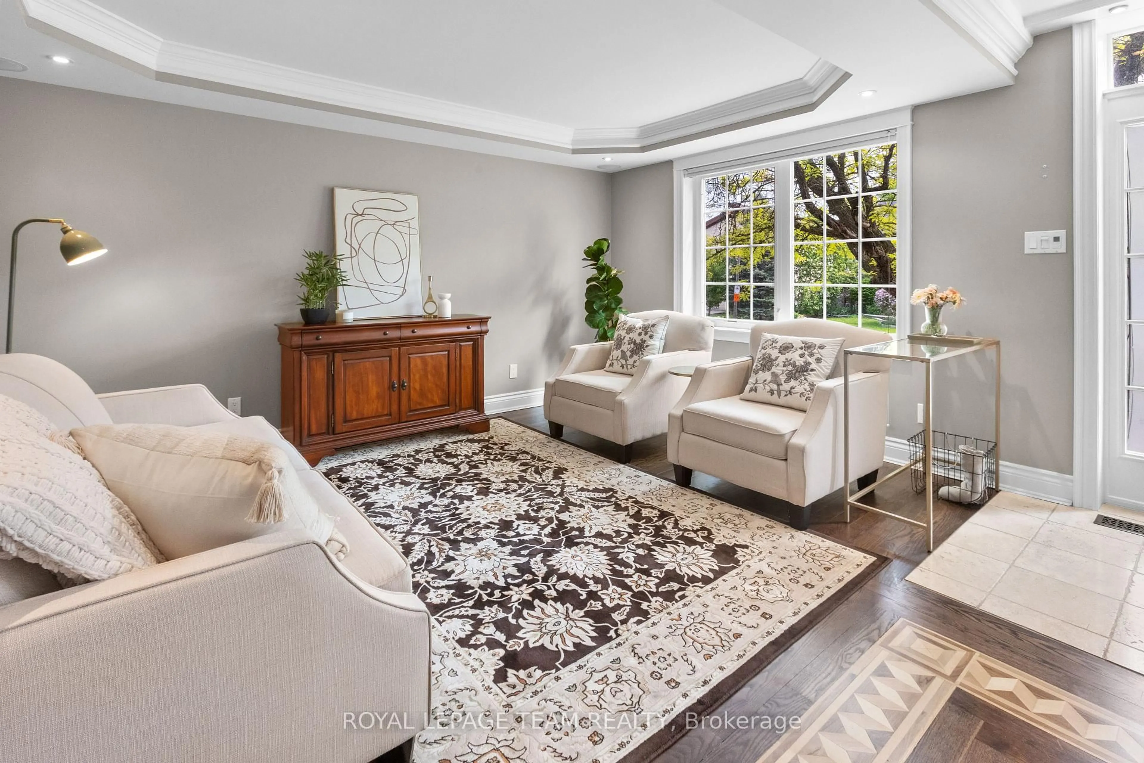 Living room with furniture, carpet floor for 524 Broadview Ave, Ottawa Ontario K2A 2L4