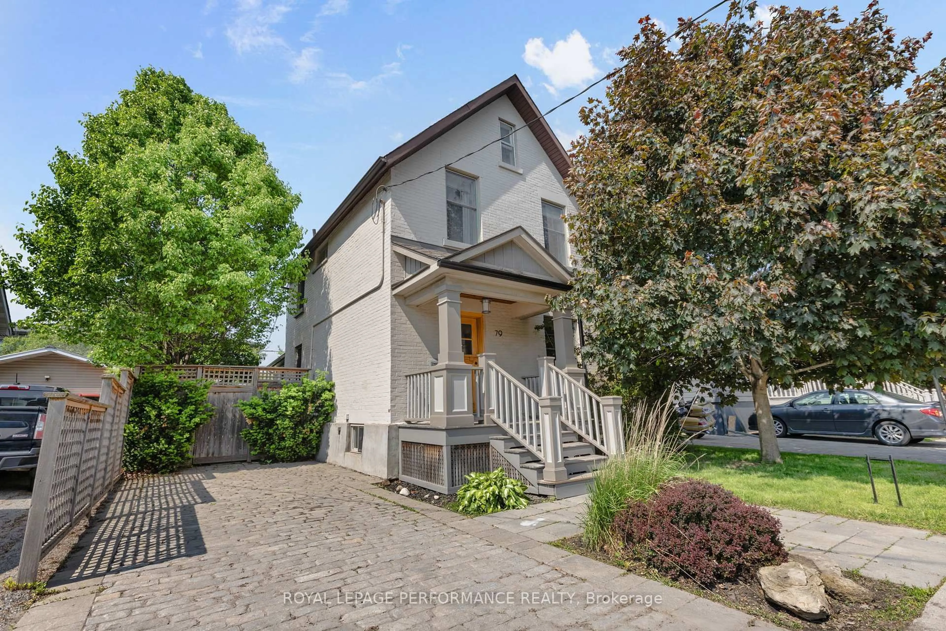 Home with brick exterior material, street for 79 Queen Mary St, Ottawa Ontario K1K 1X6