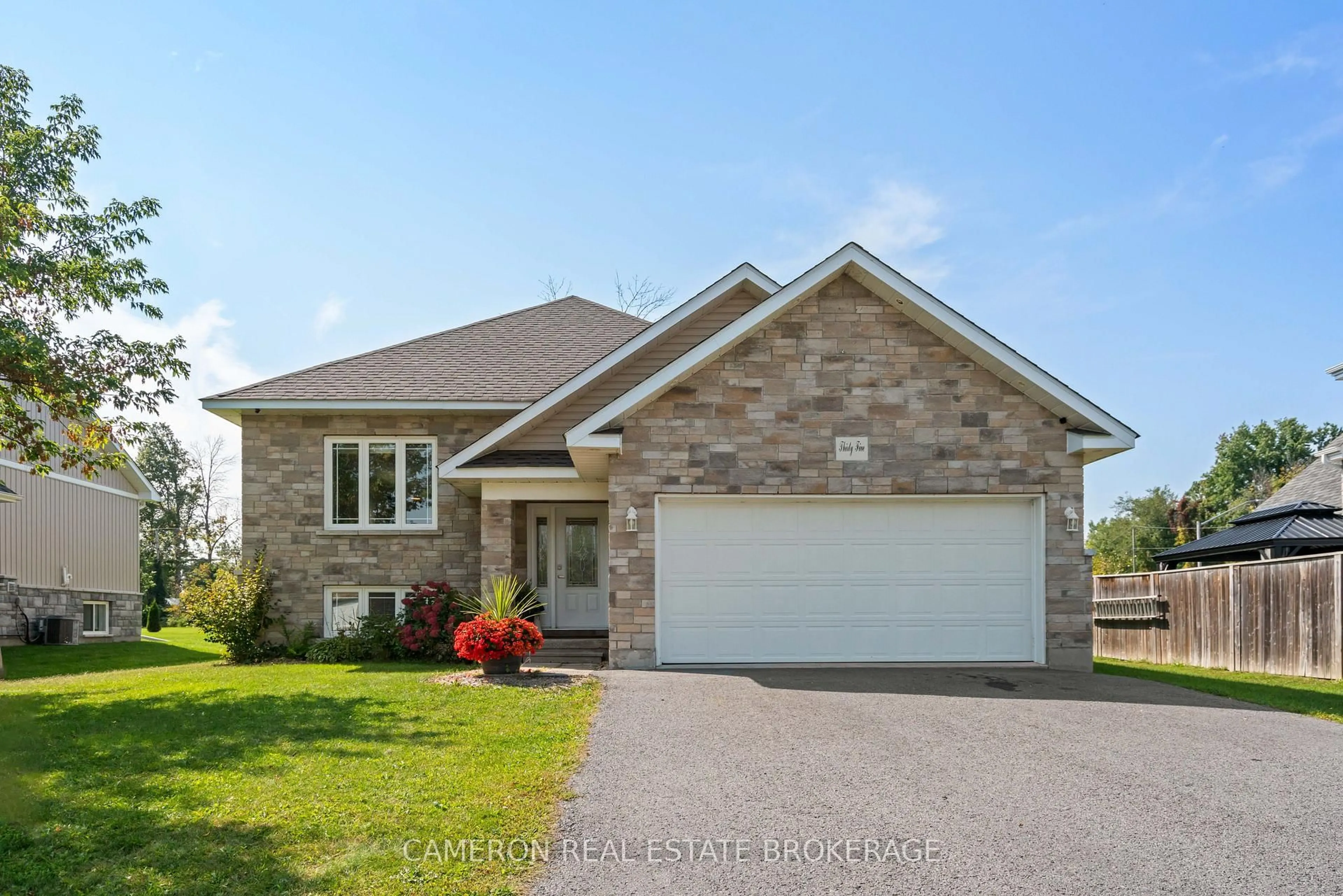 Home with brick exterior material, street for 35 Cherry Ave, South Stormont Ontario K0C 1P0