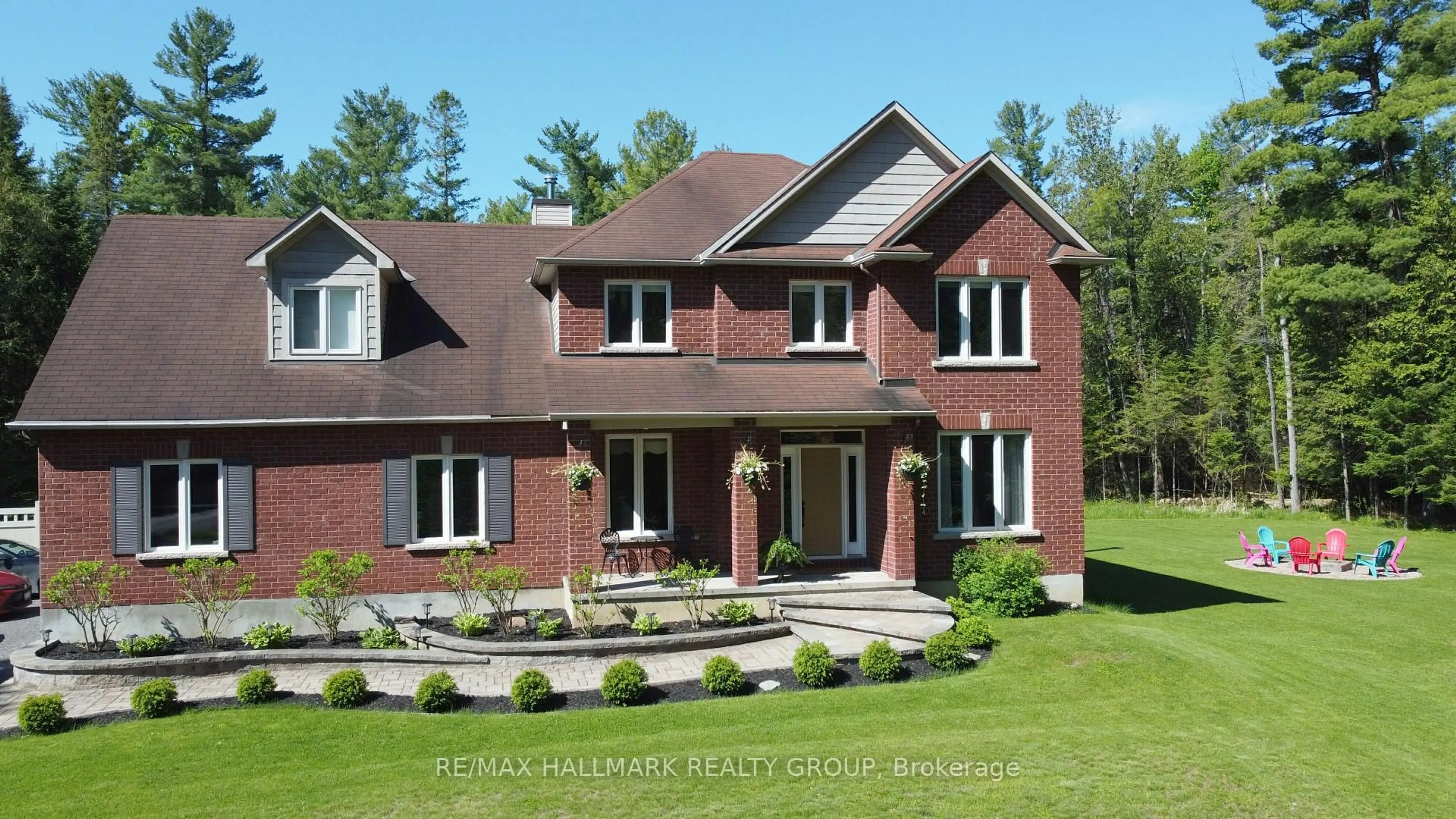 Home with brick exterior material, street for 671 Spruce Ridge Rd, Carp Ontario K0A 1L0