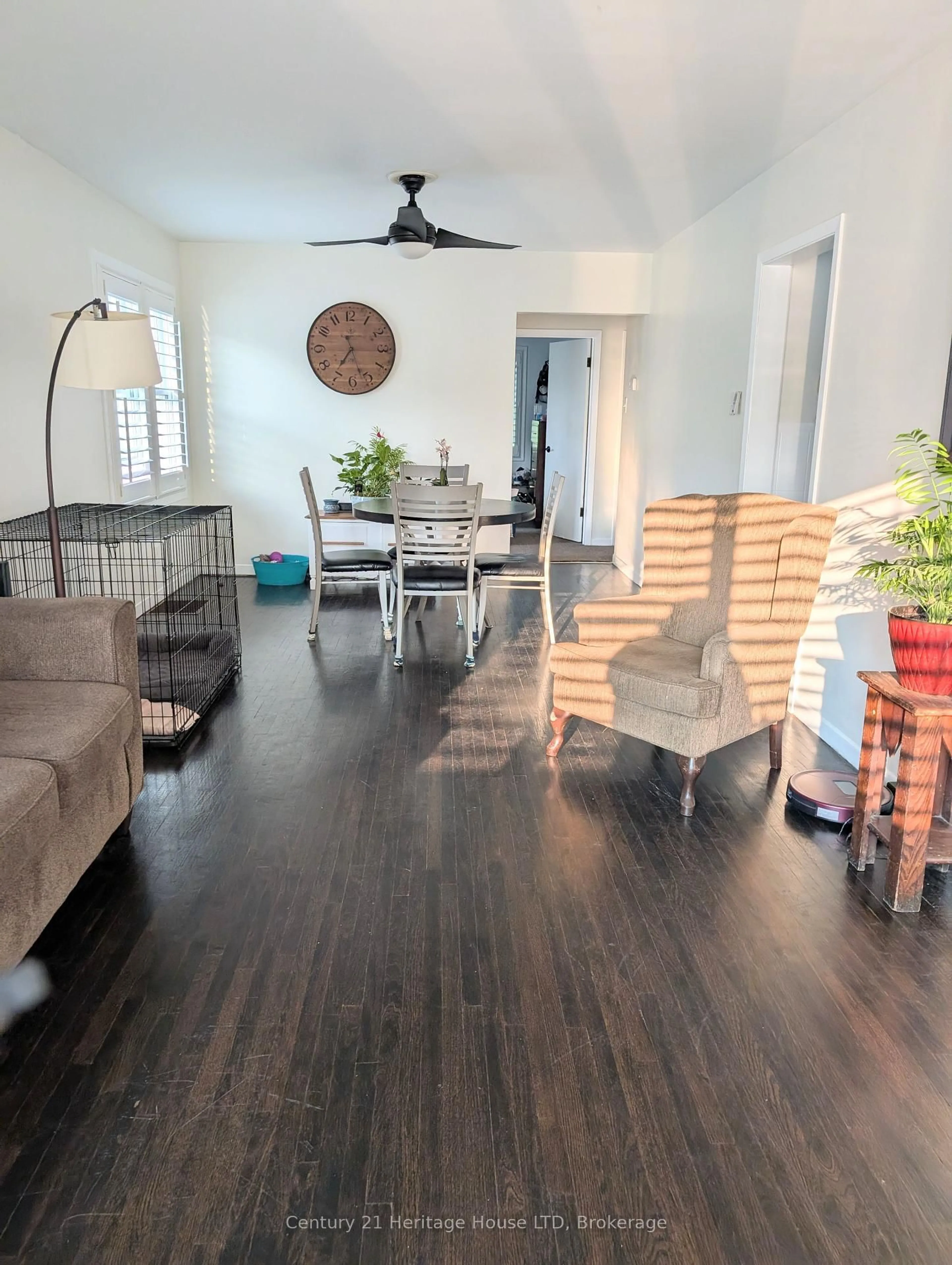 Living room with furniture, wood/laminate floor for 21 Linwood Ave, Port Colborne Ontario L3K 5J4