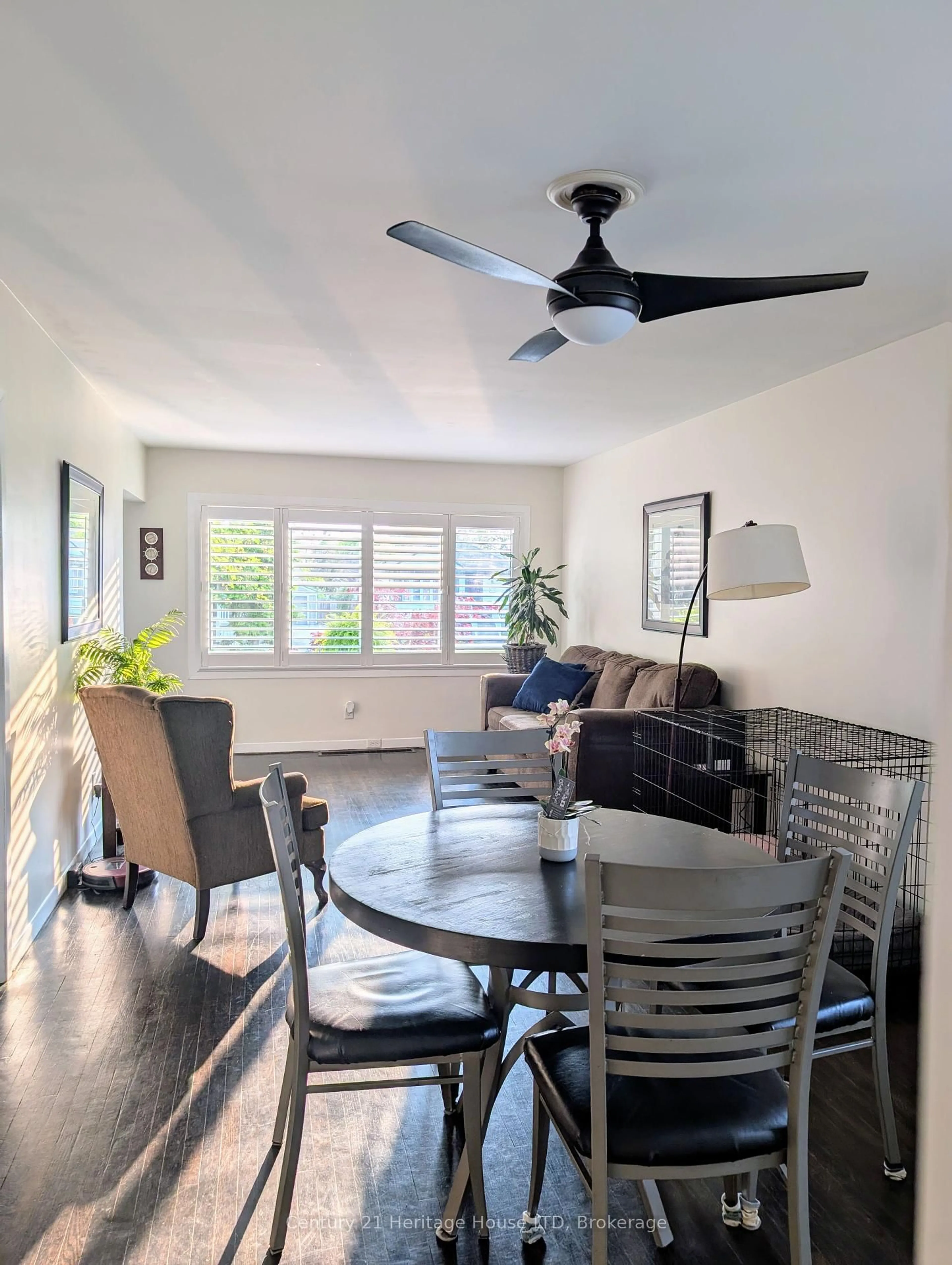Living room with furniture, wood/laminate floor for 21 Linwood Ave, Port Colborne Ontario L3K 5J4