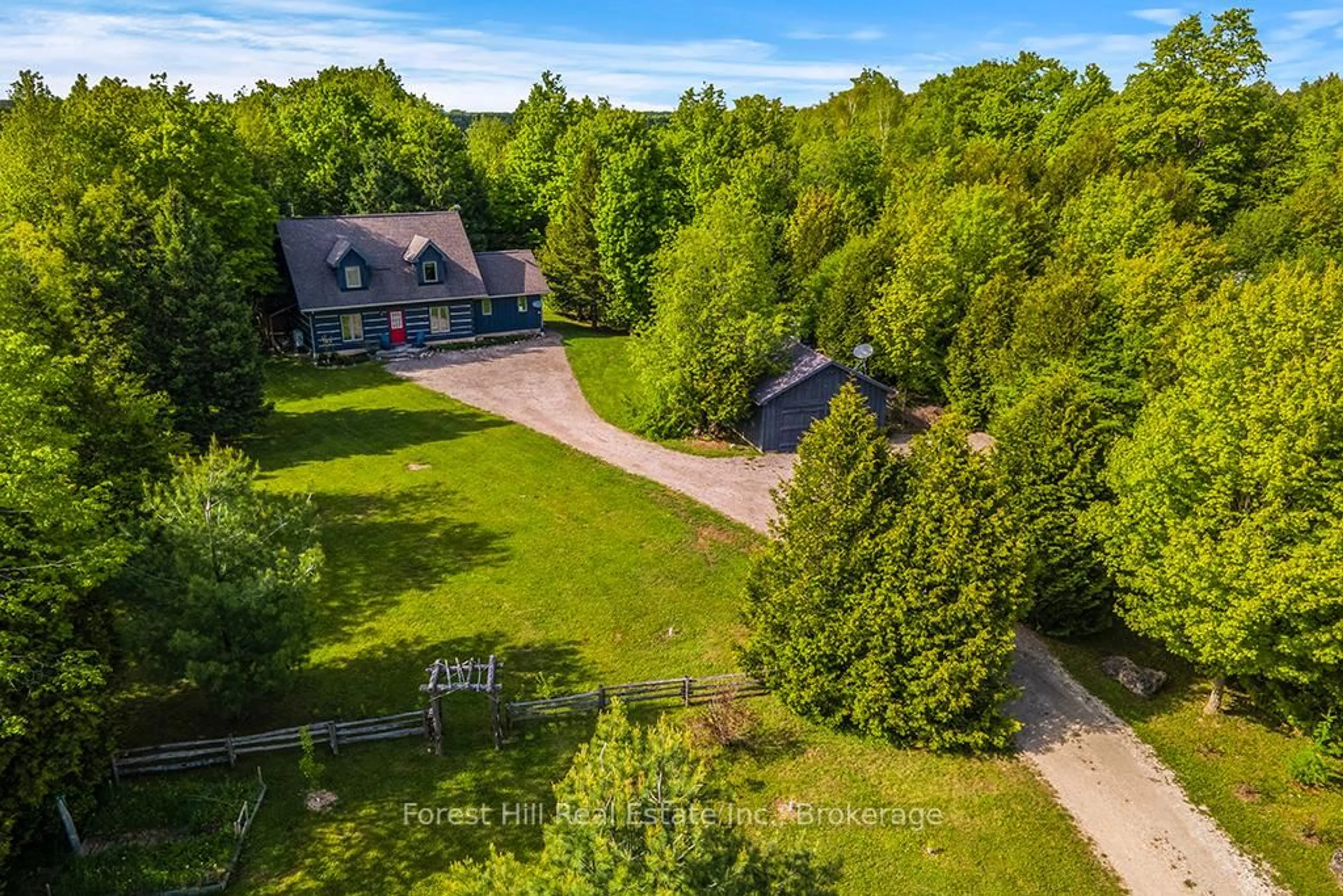A pic from outside/outdoor area/front of a property/back of a property/a pic from drone, unknown for 447151 10th Concession, Grey Highlands Ontario N0C 1E0