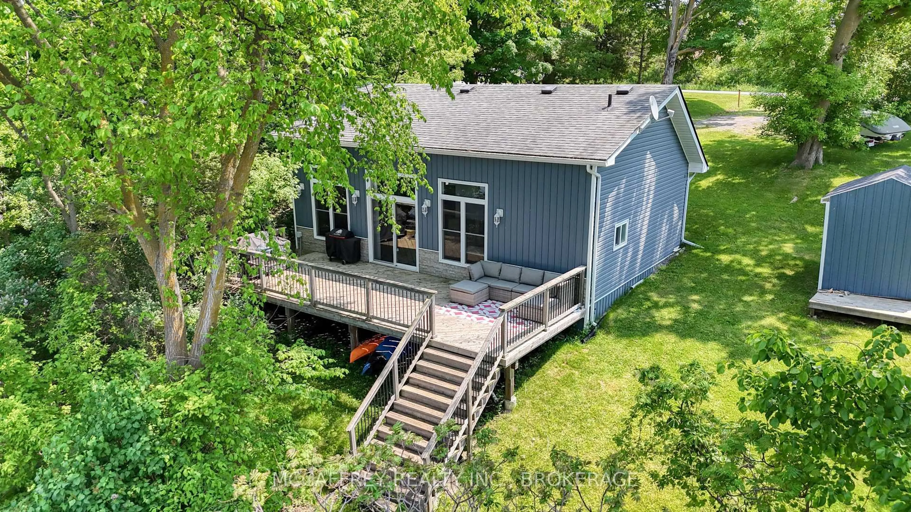 A pic from outside/outdoor area/front of a property/back of a property/a pic from drone, water/lake/river/ocean view for 1943 South Shore Rd, Napanee Ontario K7R 3K7