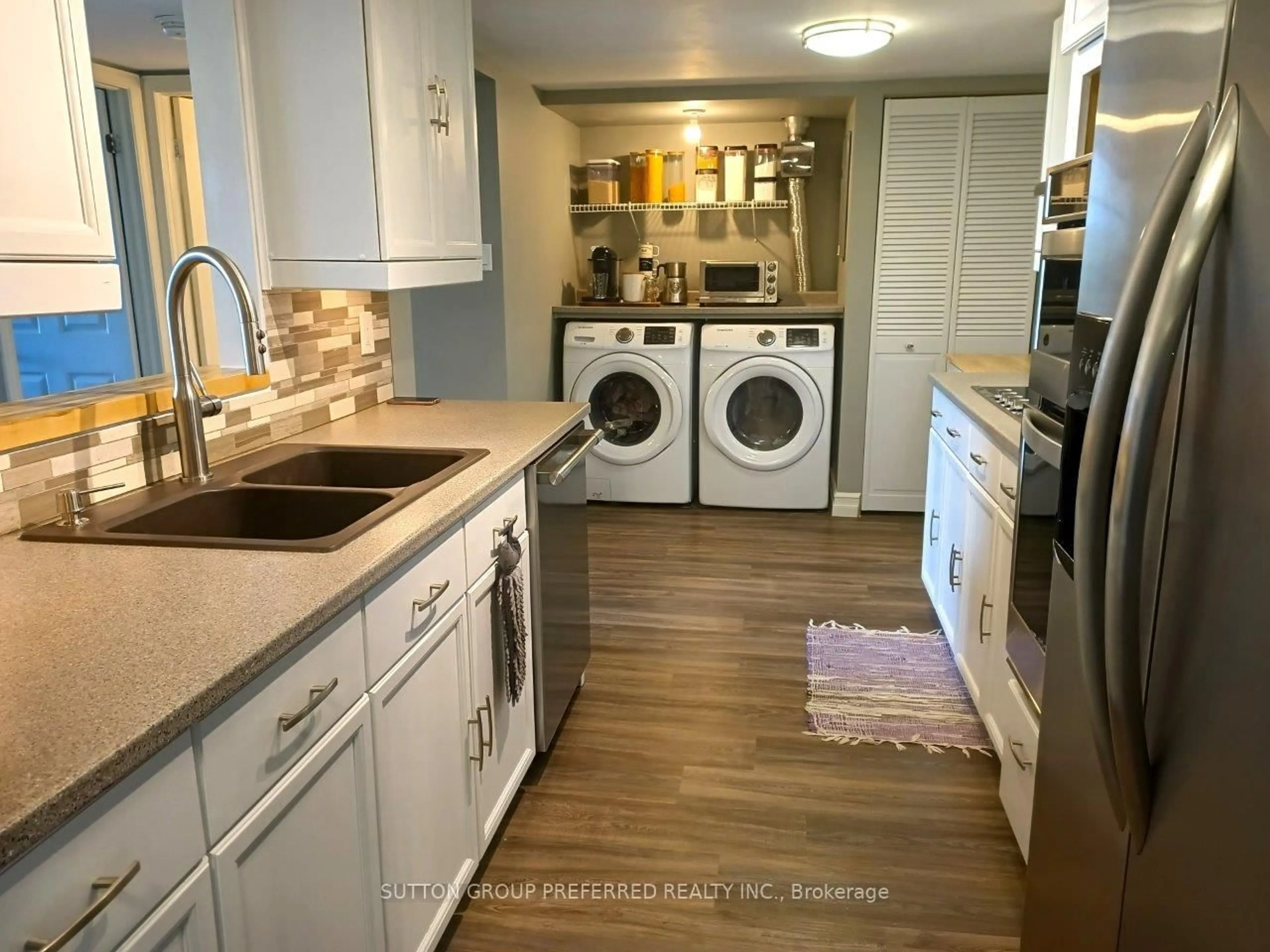 Kitchen with laundary machines, ceramic/tile floor for 1510 Richmond St #805, London North Ontario N6G 4V2
