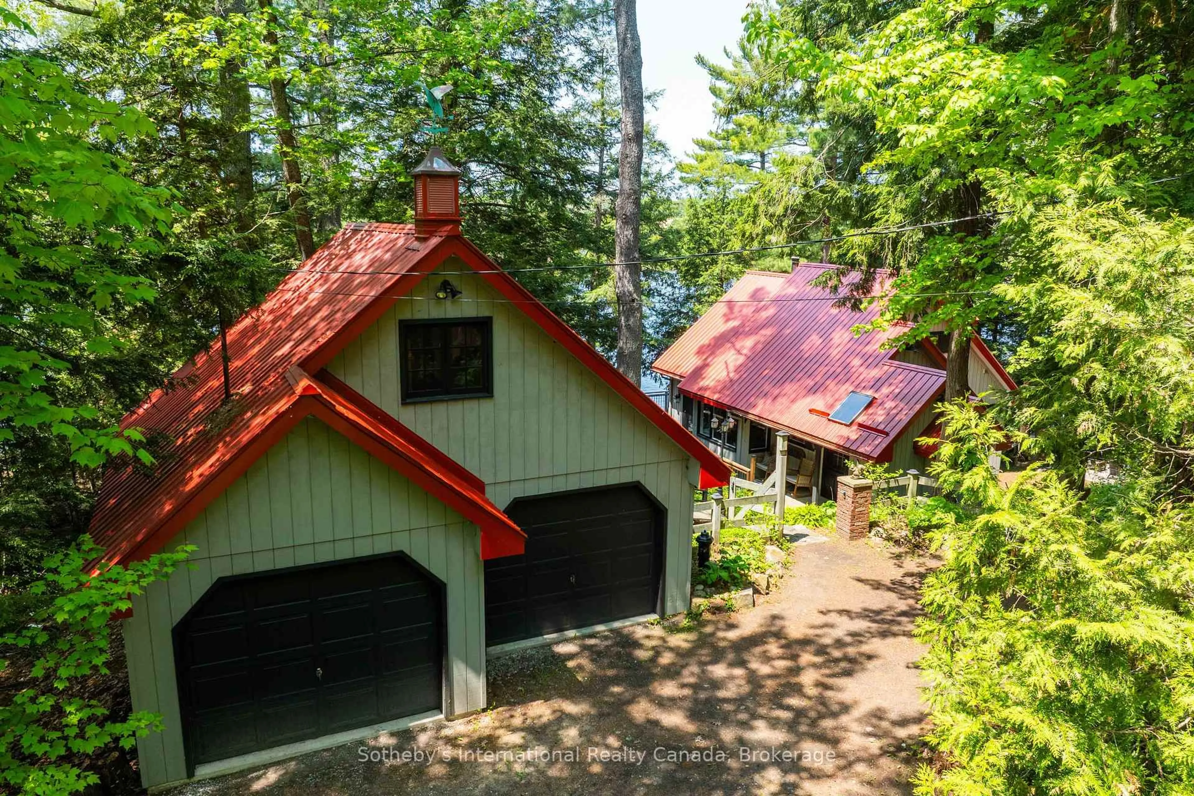 A pic from outside/outdoor area/front of a property/back of a property/a pic from drone, unknown for 1050 Cobble Rose Lane, Minden Hills Ontario K0M 2L1