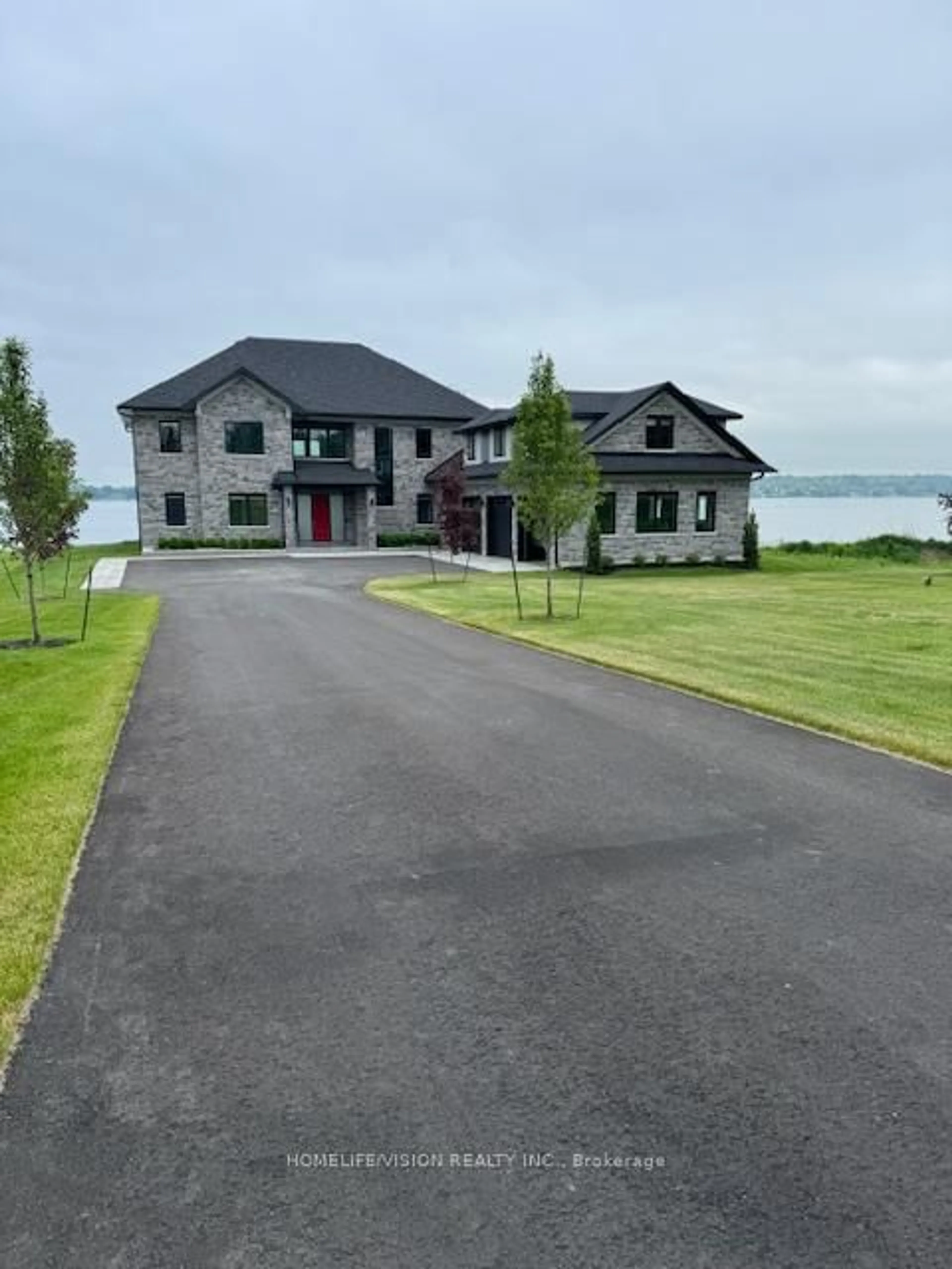 A pic from outside/outdoor area/front of a property/back of a property/a pic from drone, water/lake/river/ocean view for 1828 Old Highway 2, Belleville Ontario K8N 4Z2