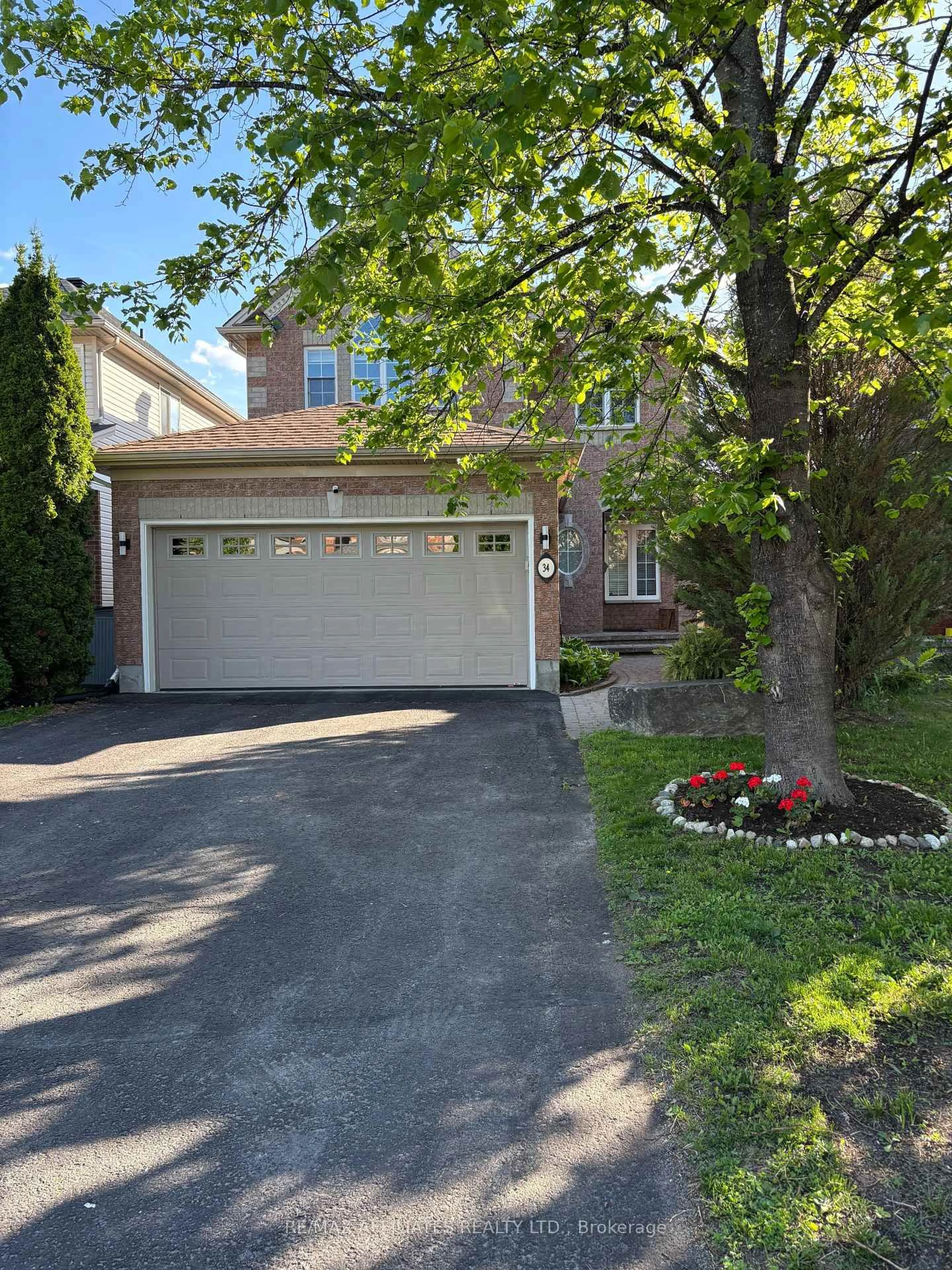 A pic from outside/outdoor area/front of a property/back of a property/a pic from drone, street for 34 Catterick Cres, Ottawa Ontario K2K 3M5