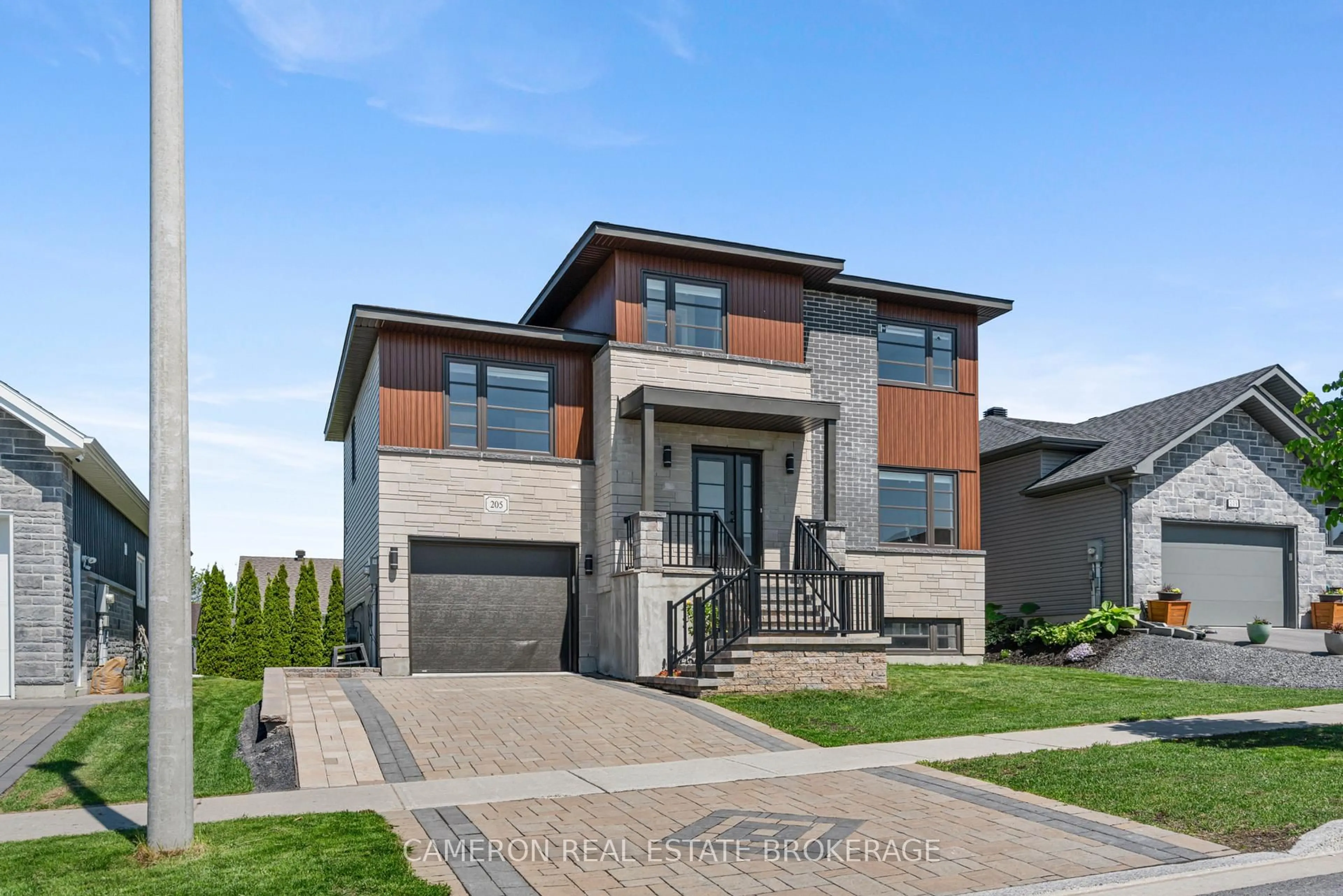Home with brick exterior material, street for 205 Eastport Dr, Cornwall Ontario K6H 0G9