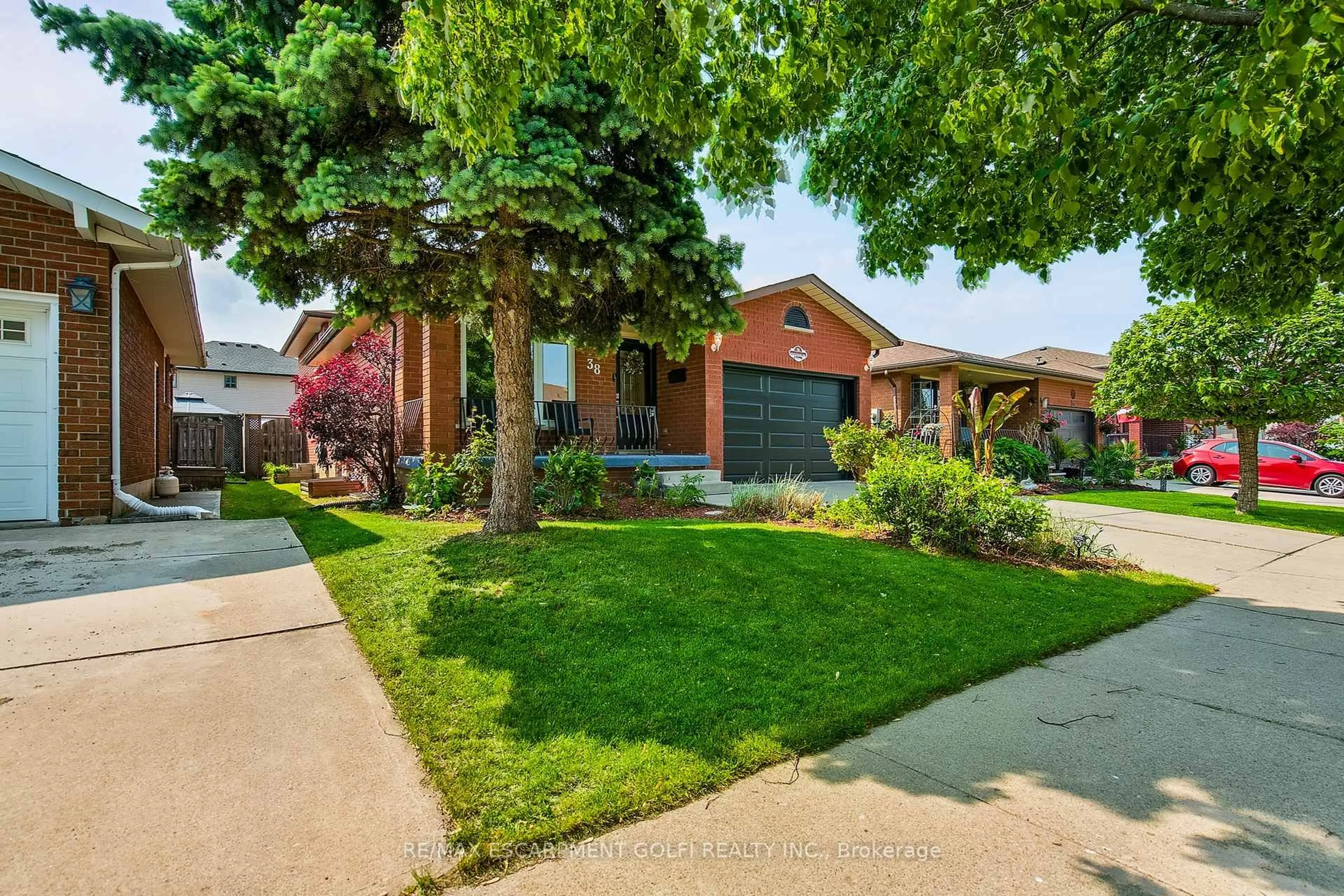 Home with brick exterior material, street for 38 Pinewoods Dr, Hamilton Ontario L8J 2T5