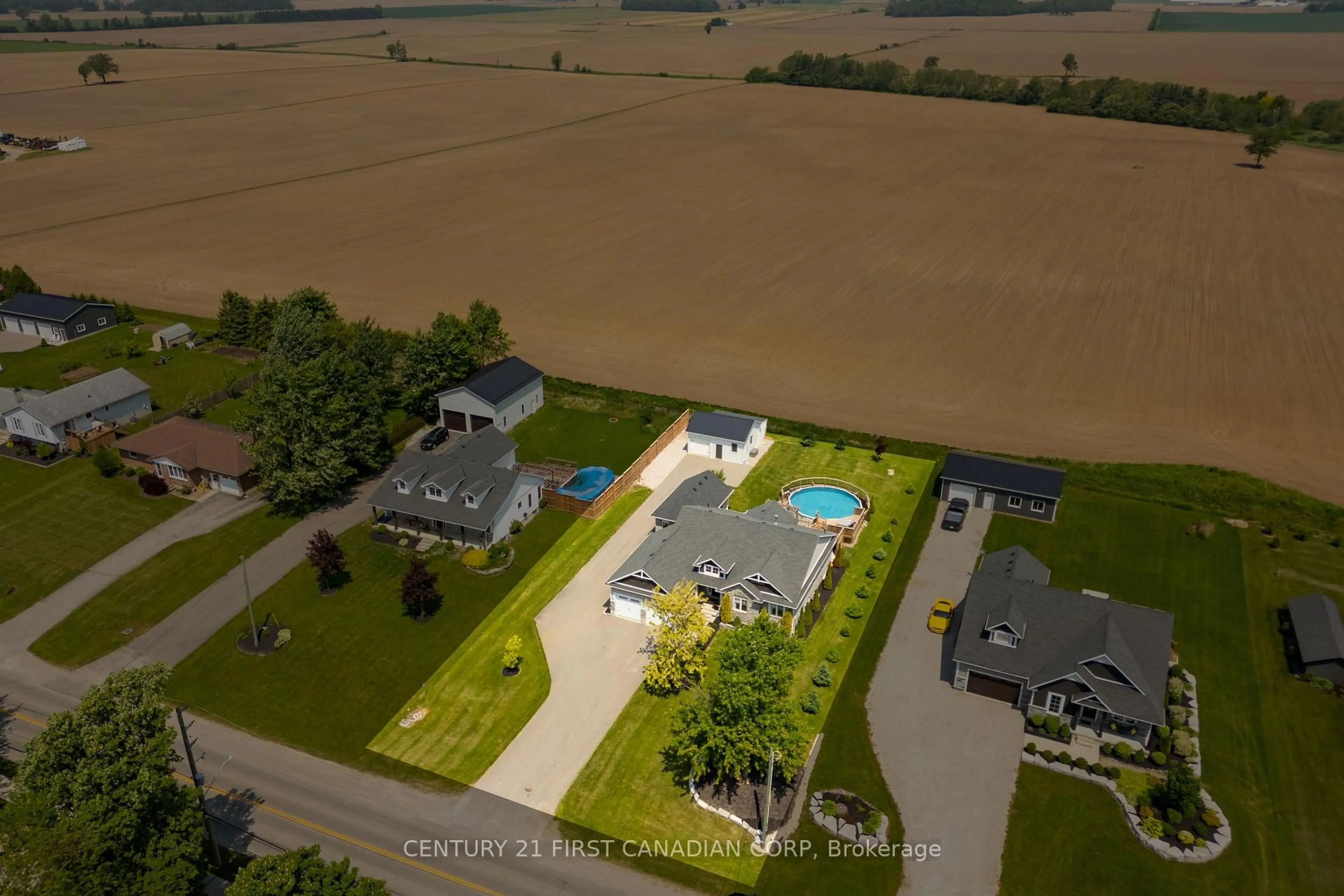A pic from outside/outdoor area/front of a property/back of a property/a pic from drone, water/lake/river/ocean view for 51000 RON MCNEIL Line, Malahide Ontario N0L 2J0
