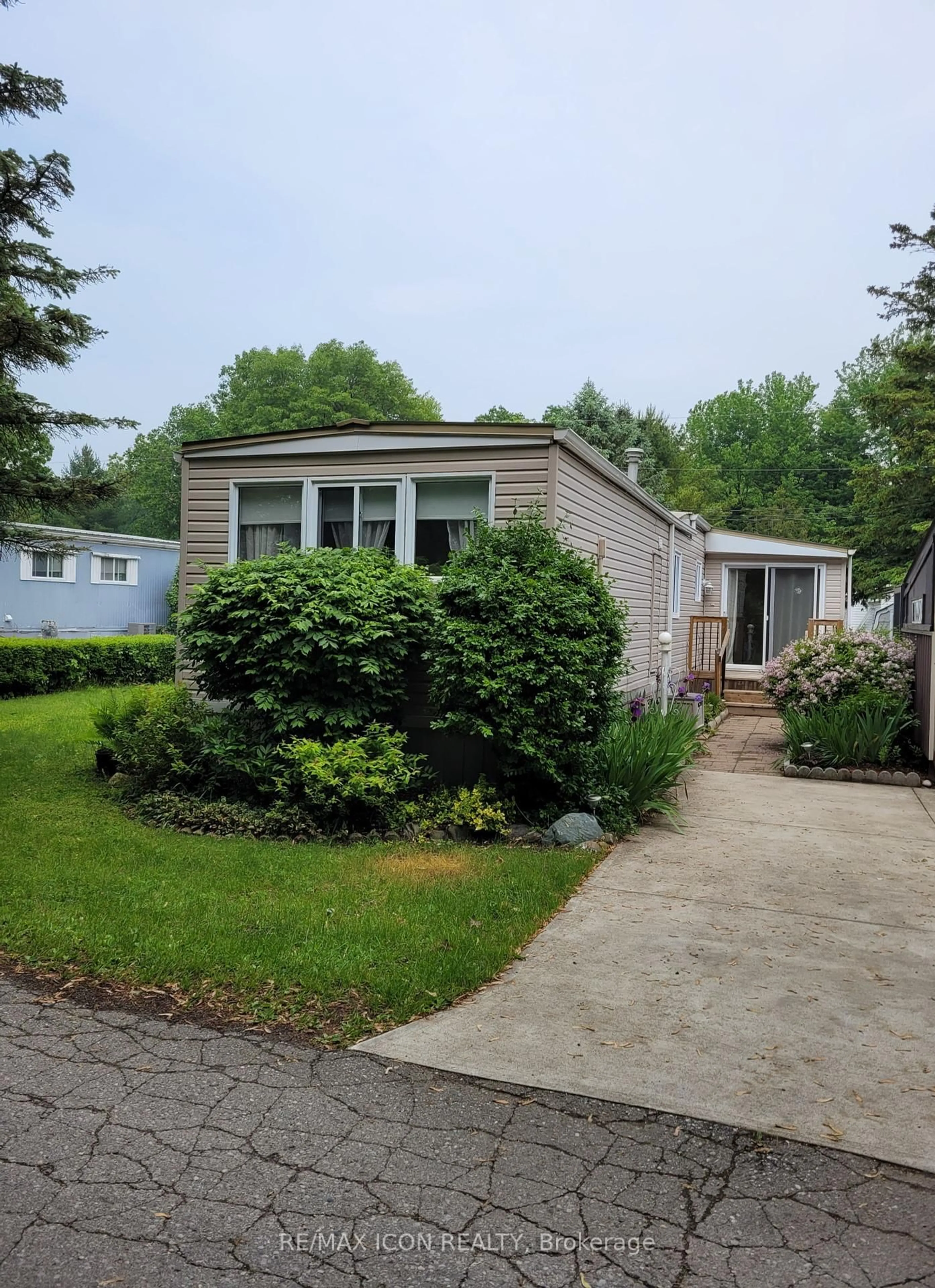 Home with vinyl exterior material, street for 9839 Lakeshore Rd #17, Lambton Shores Ontario N0M 1T0