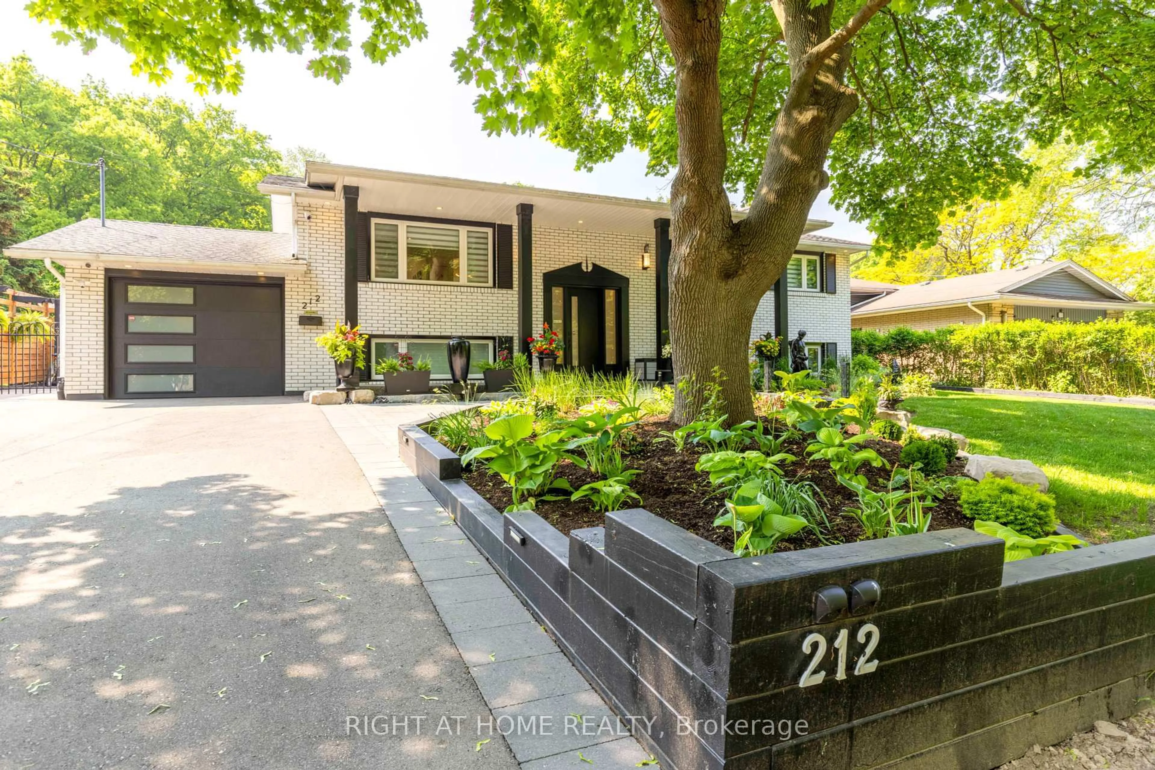 Home with brick exterior material, street for 212 Lockhart Dr, St. Catharines Ontario L2T 1X1