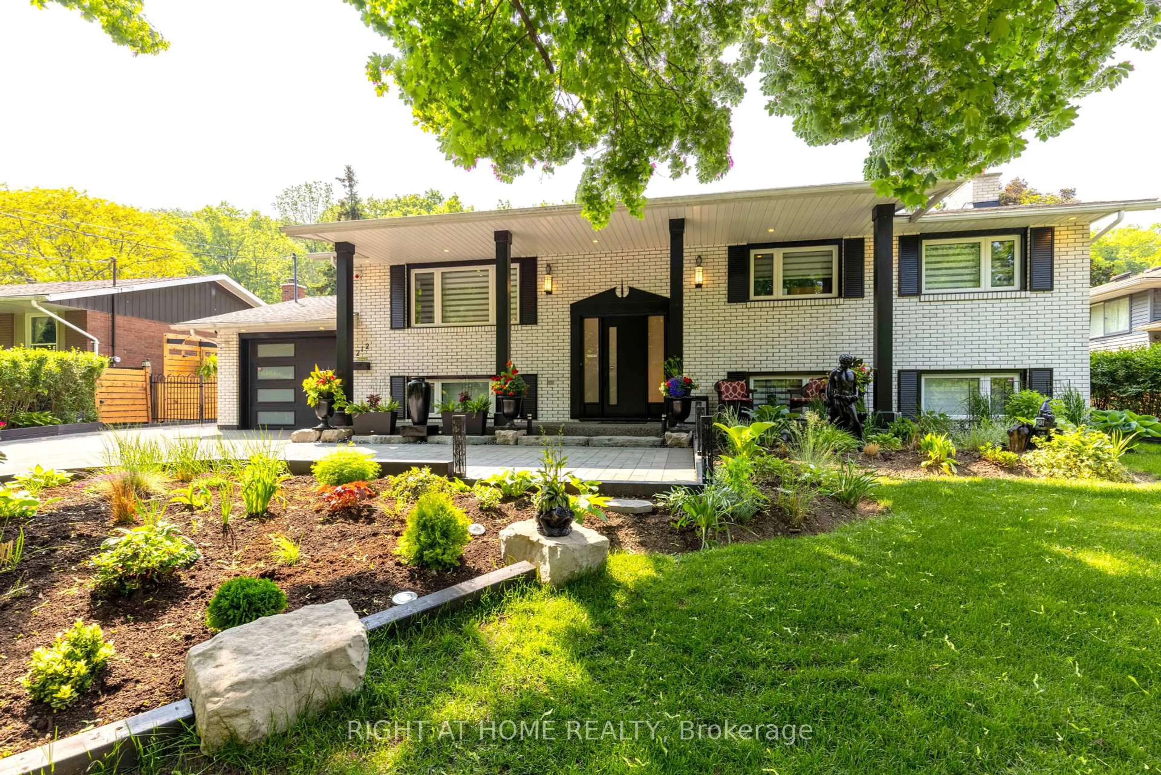 Home with brick exterior material, street for 212 Lockhart Dr, St. Catharines Ontario L2T 1X1