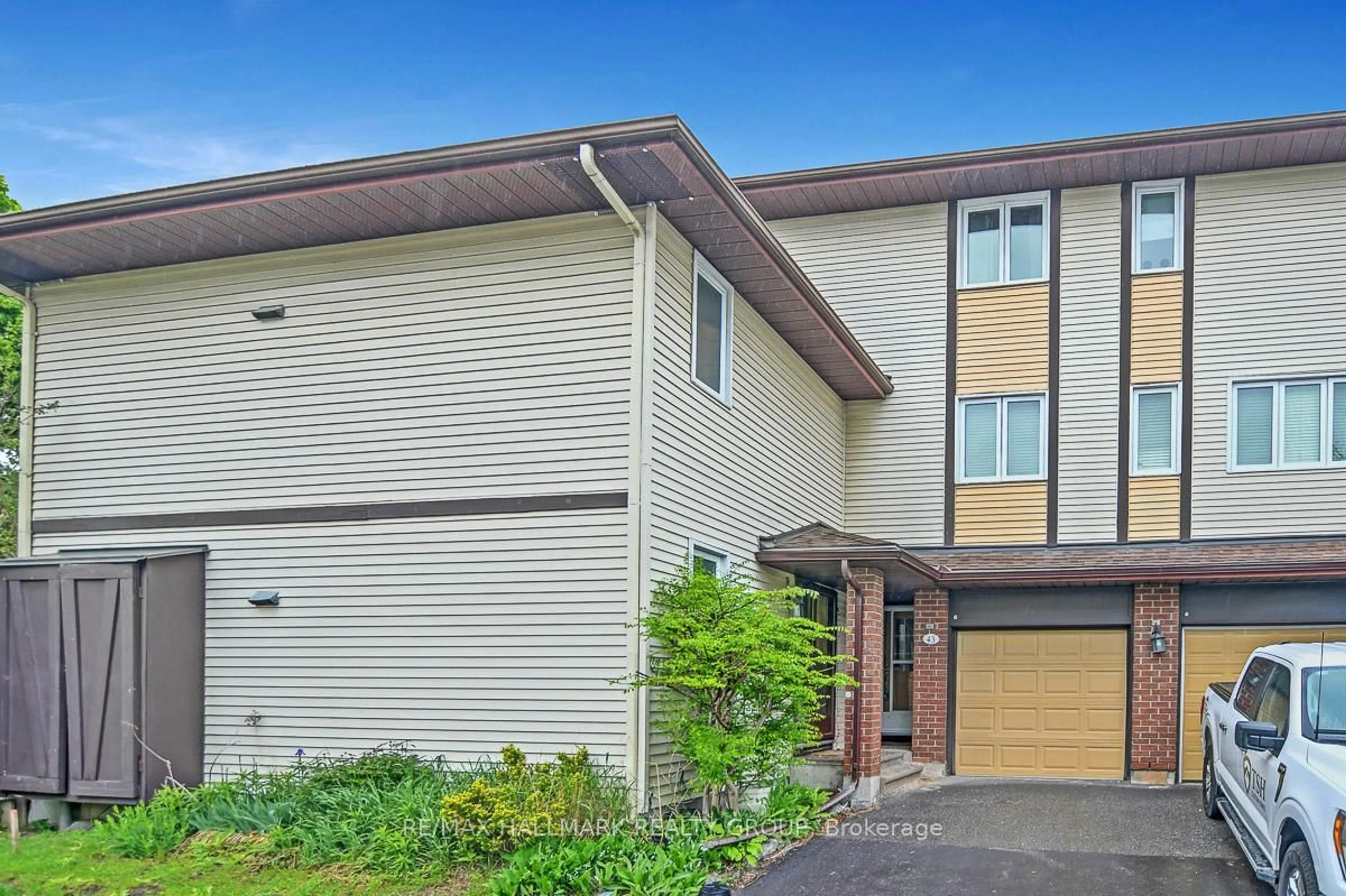 Home with vinyl exterior material, street for 43 Haxby Private #51, Ottawa Ontario K1T 3B7