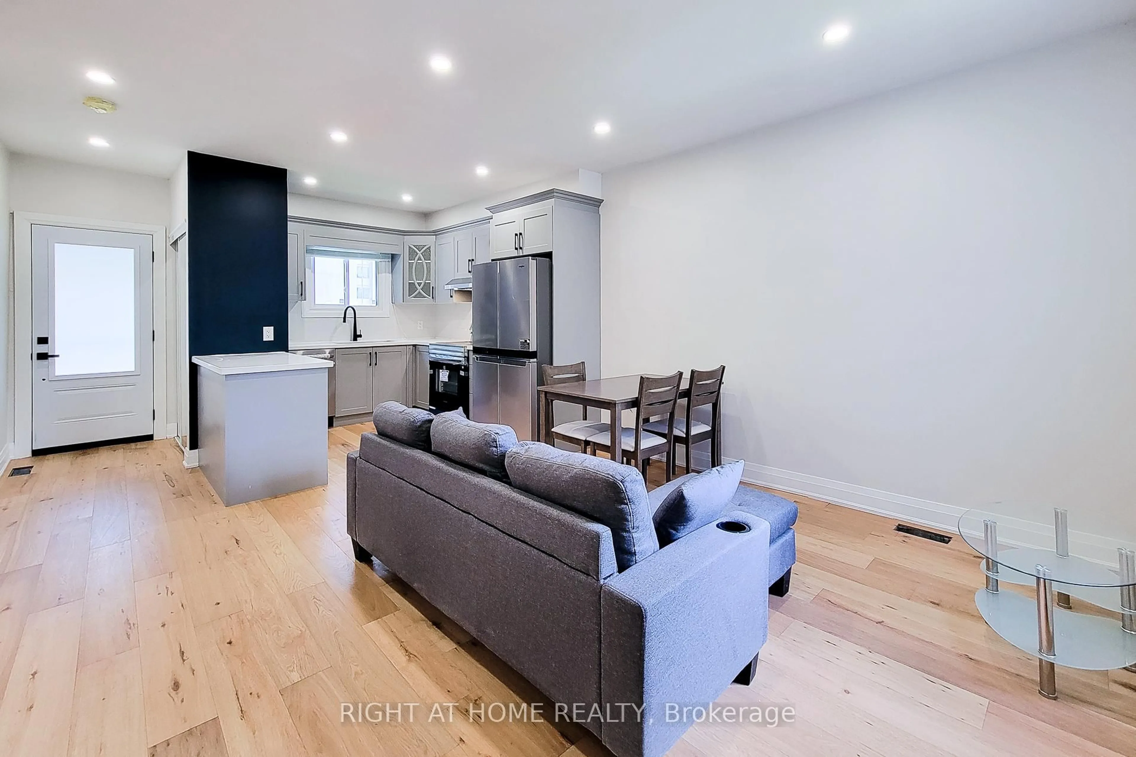 Open concept kitchen, wood/laminate floor for 53 West Ave, Hamilton Ontario L8L 5C1