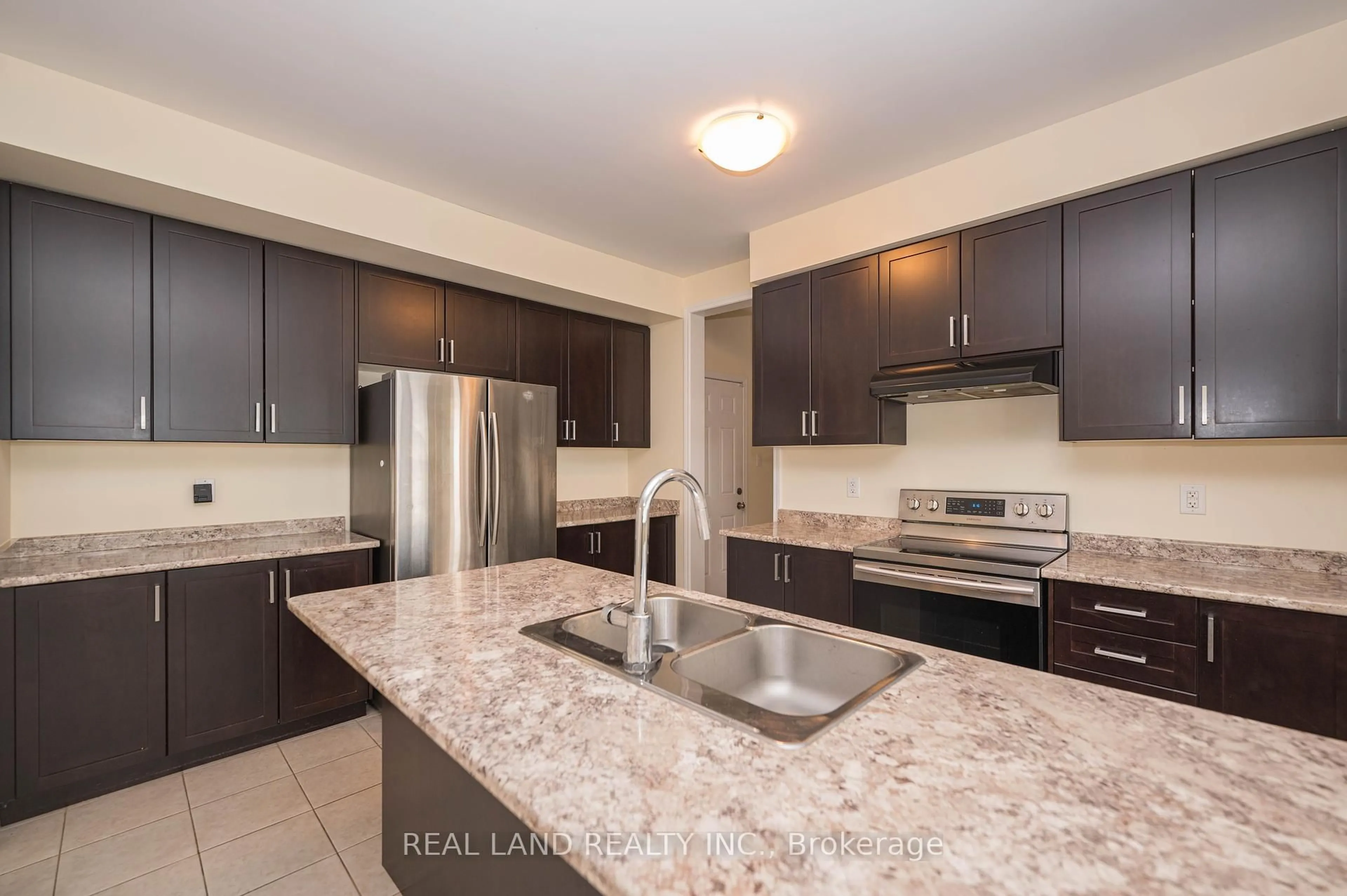 Open concept kitchen, ceramic/tile floor for 7782 Hackberry Tr, Niagara Falls Ontario L2H 3R5