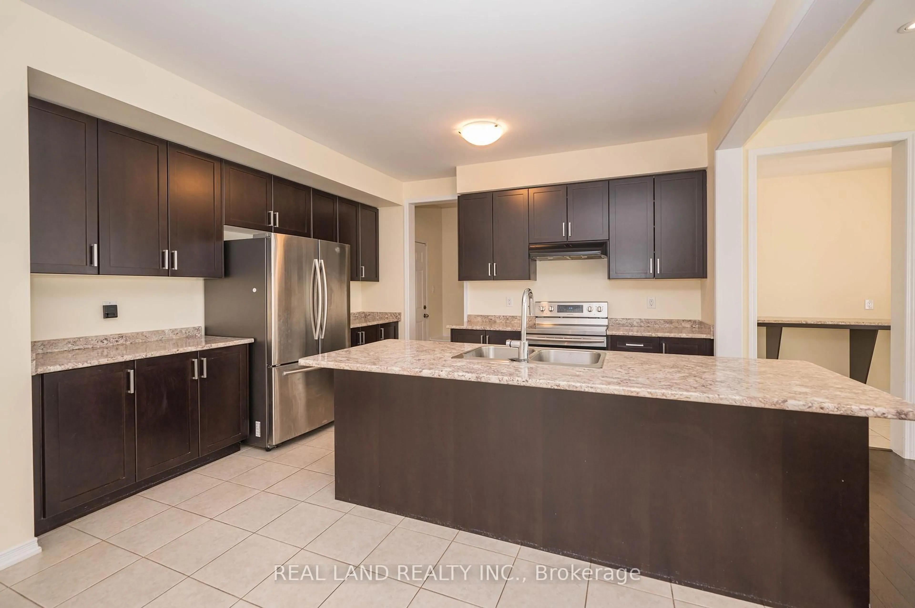 Open concept kitchen, ceramic/tile floor for 7782 Hackberry Tr, Niagara Falls Ontario L2H 3R5