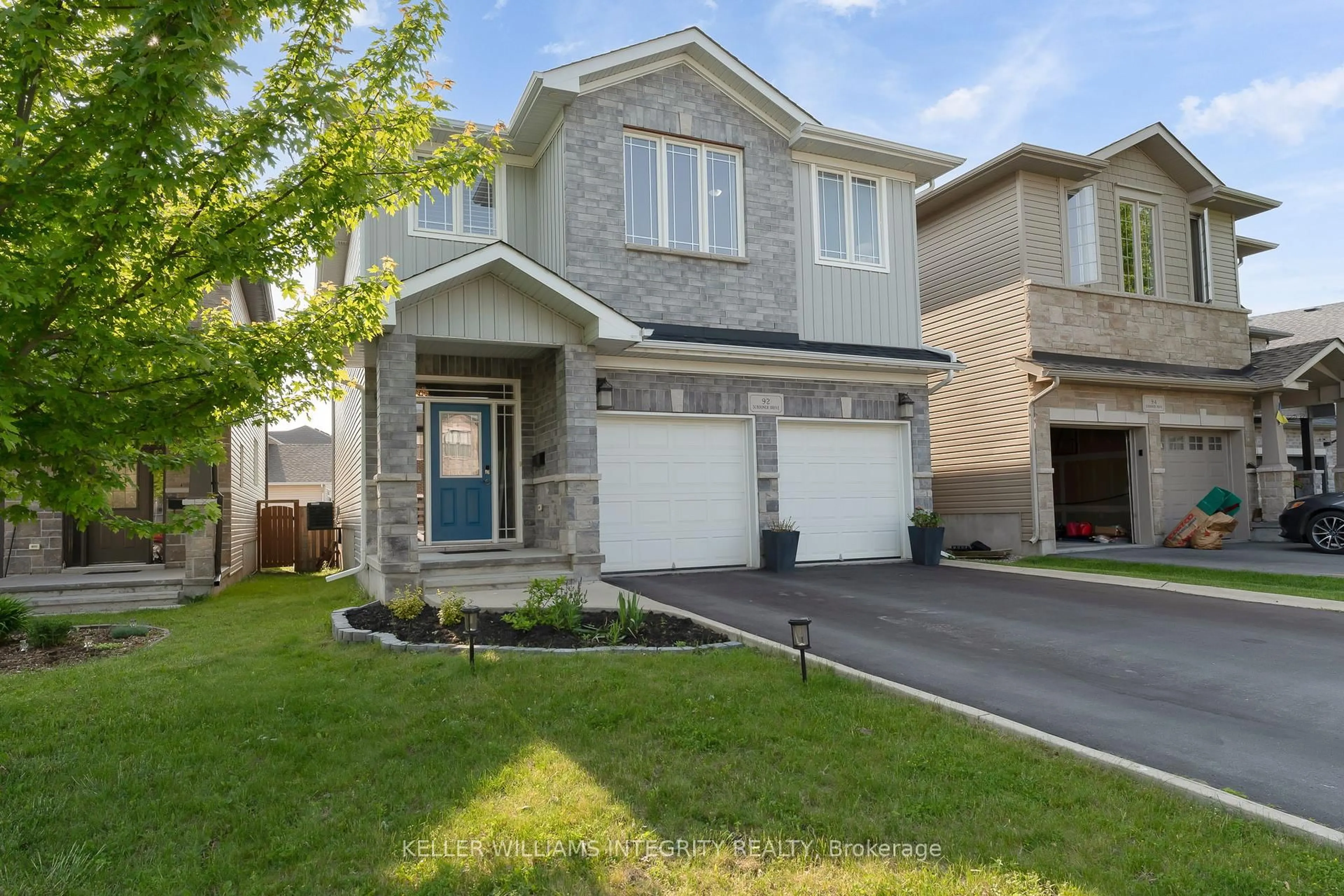 Home with brick exterior material, street for 92 Schooner Dr, Kingston Ontario K7K 0E8
