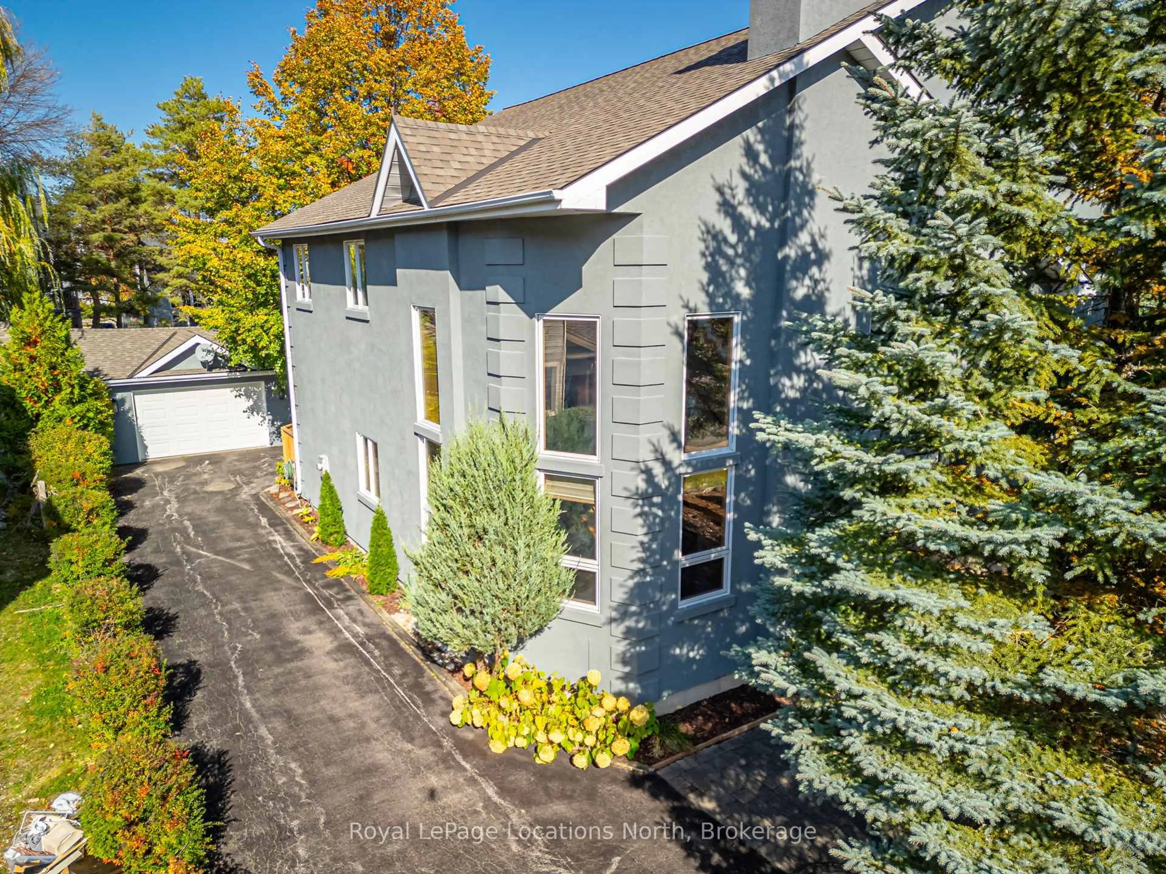 A pic from outside/outdoor area/front of a property/back of a property/a pic from drone, street for 137 Pioneer Lane, Blue Mountains Ontario L9Y 0M7