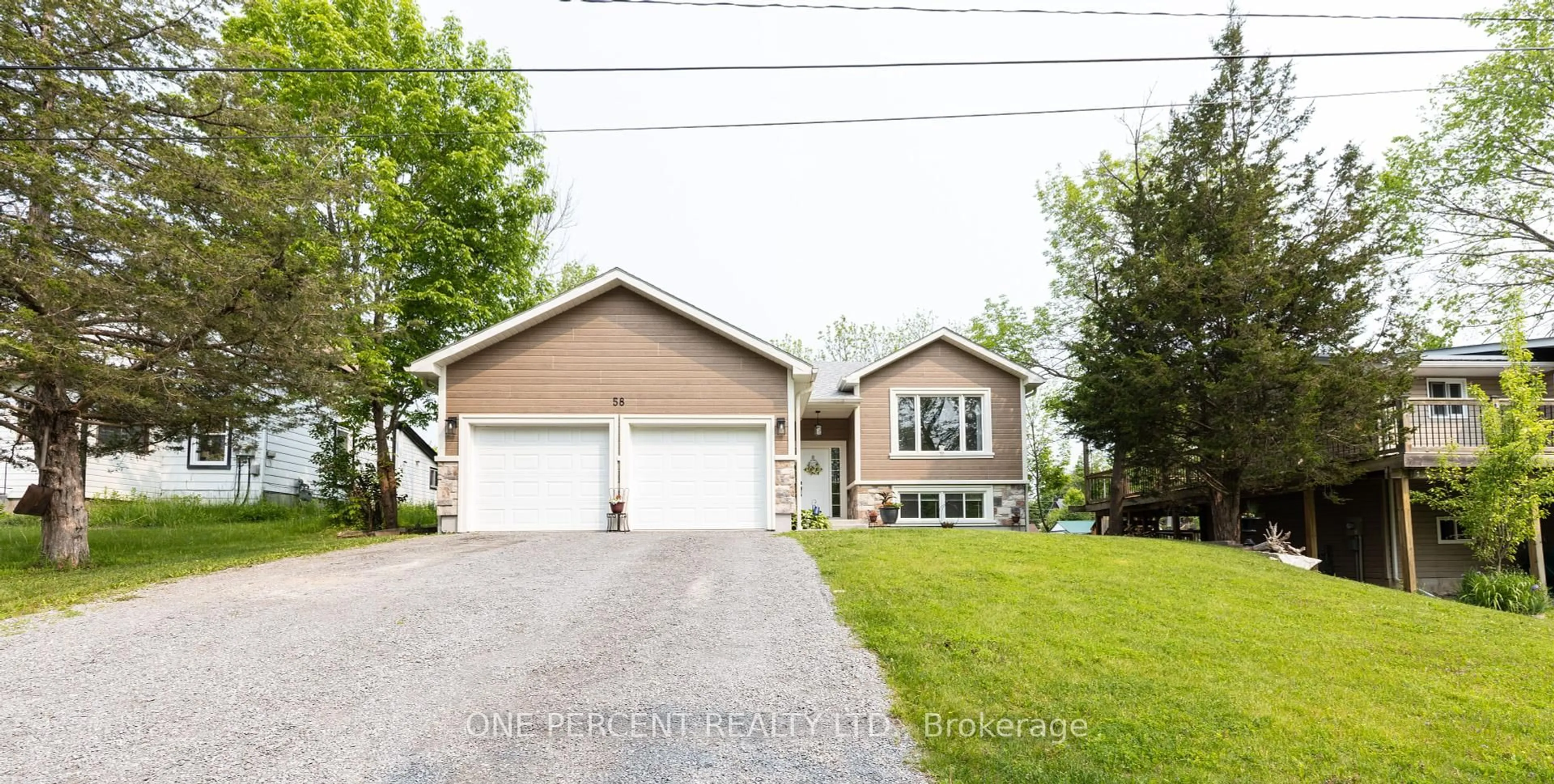 Home with vinyl exterior material, street for 58 Mckenzie St, Madoc Ontario K0K 2K0