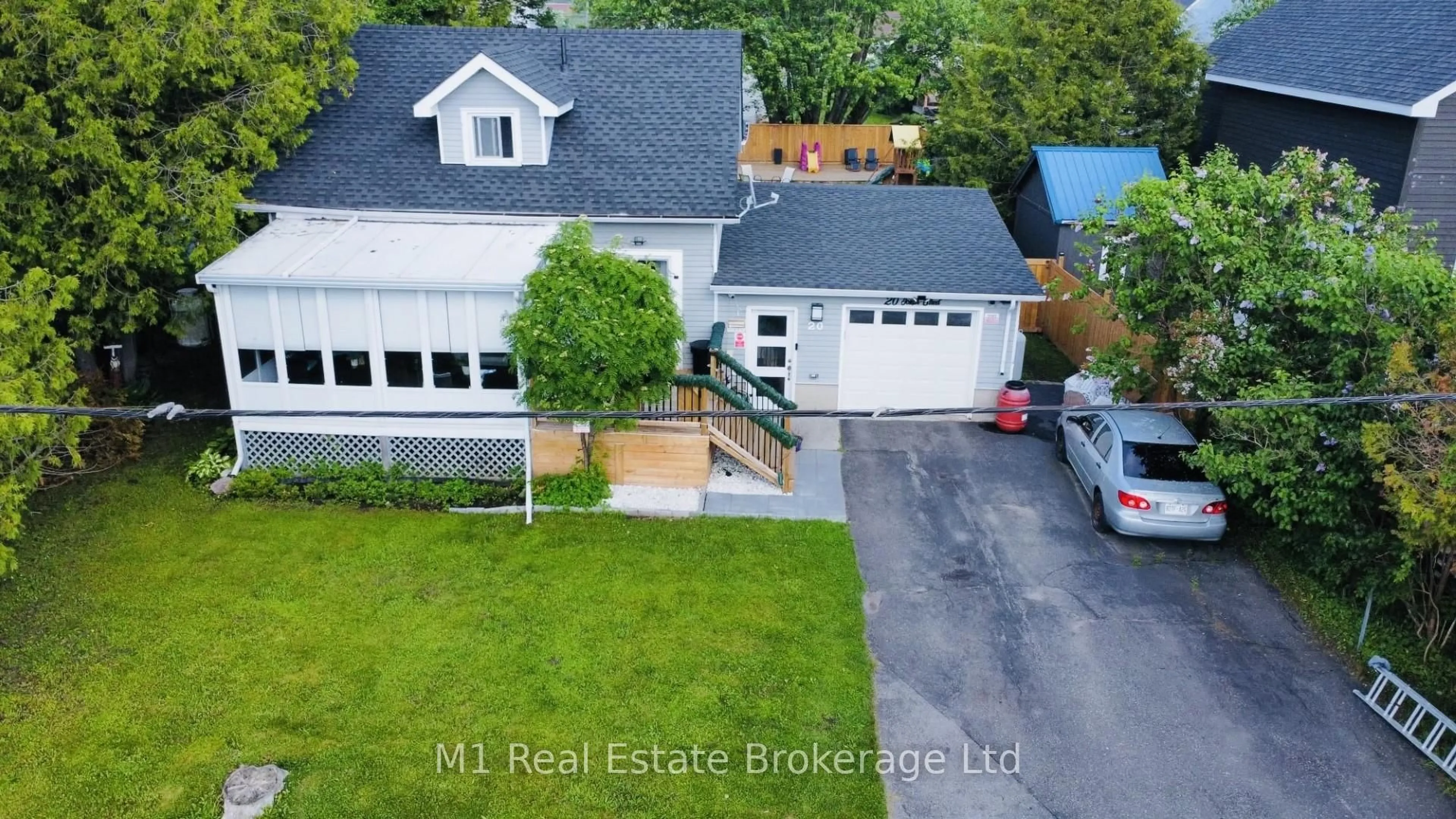 A pic from outside/outdoor area/front of a property/back of a property/a pic from drone, street for 20 Joseph St, Georgian Bay Ontario P0C 1H0