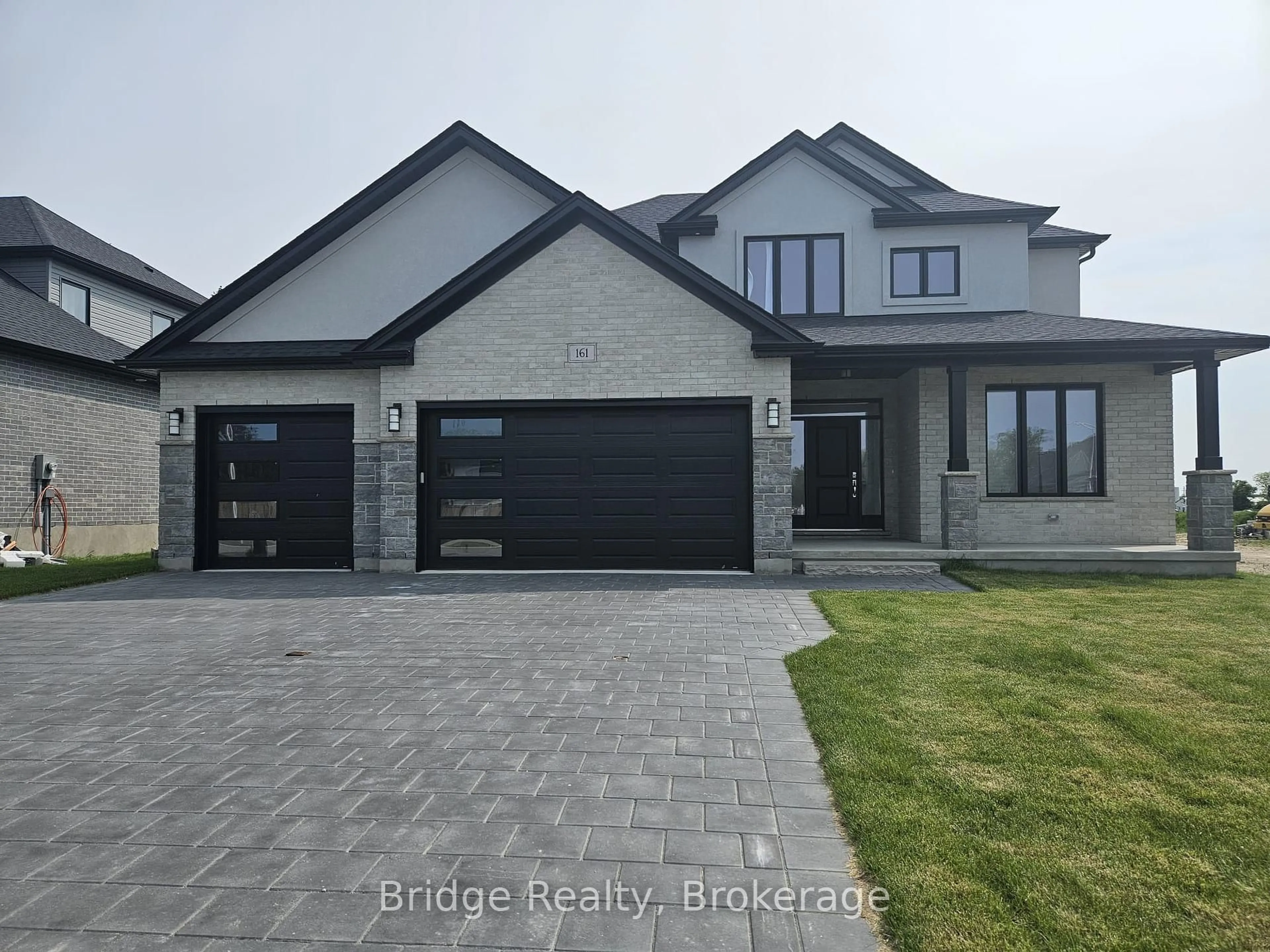 Home with brick exterior material, street for 161 Mcleod St, North Middlesex Ontario N0M 2K0