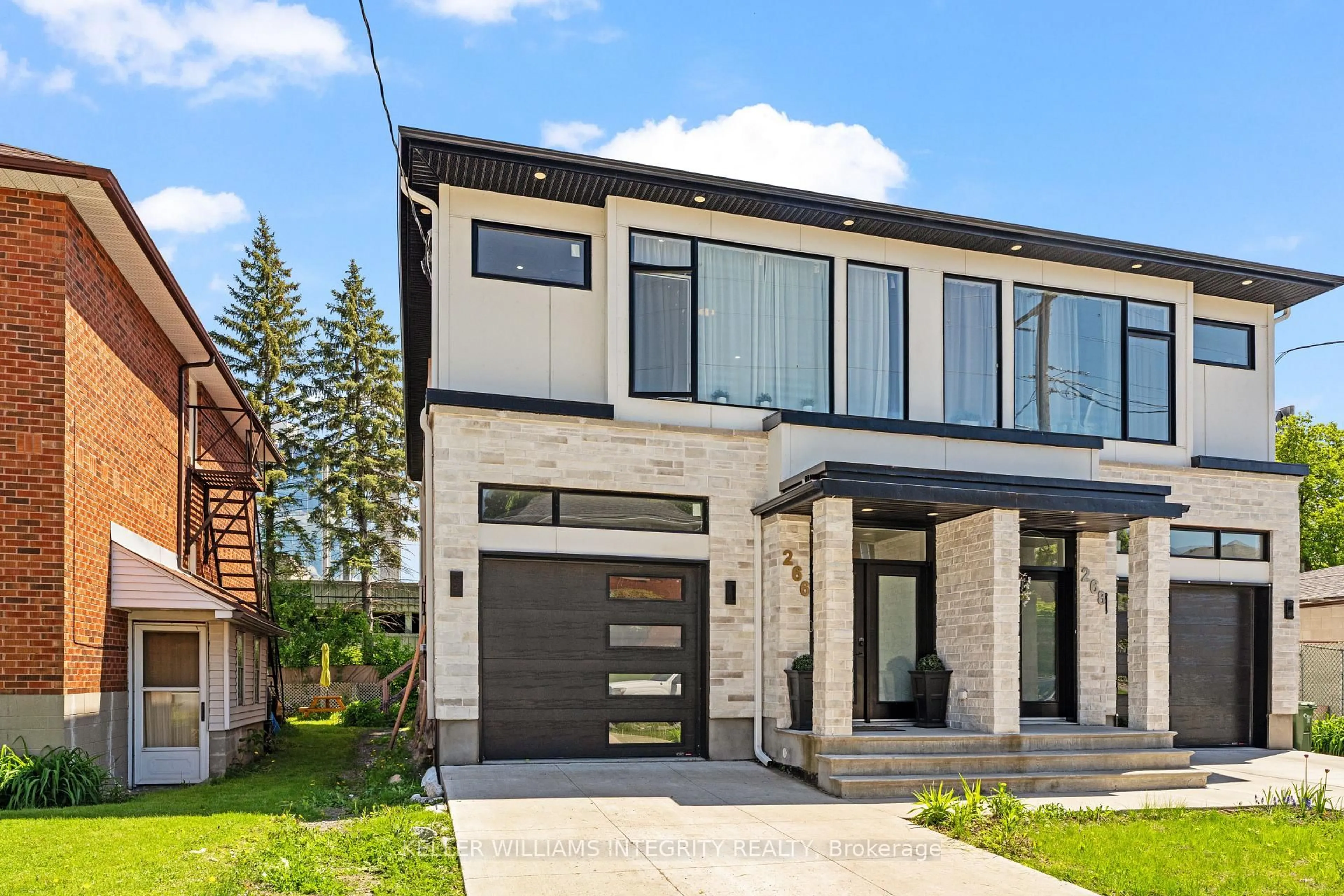 Home with brick exterior material, street for 266 CURRELL Ave, Ottawa Ontario K1Z 7J6