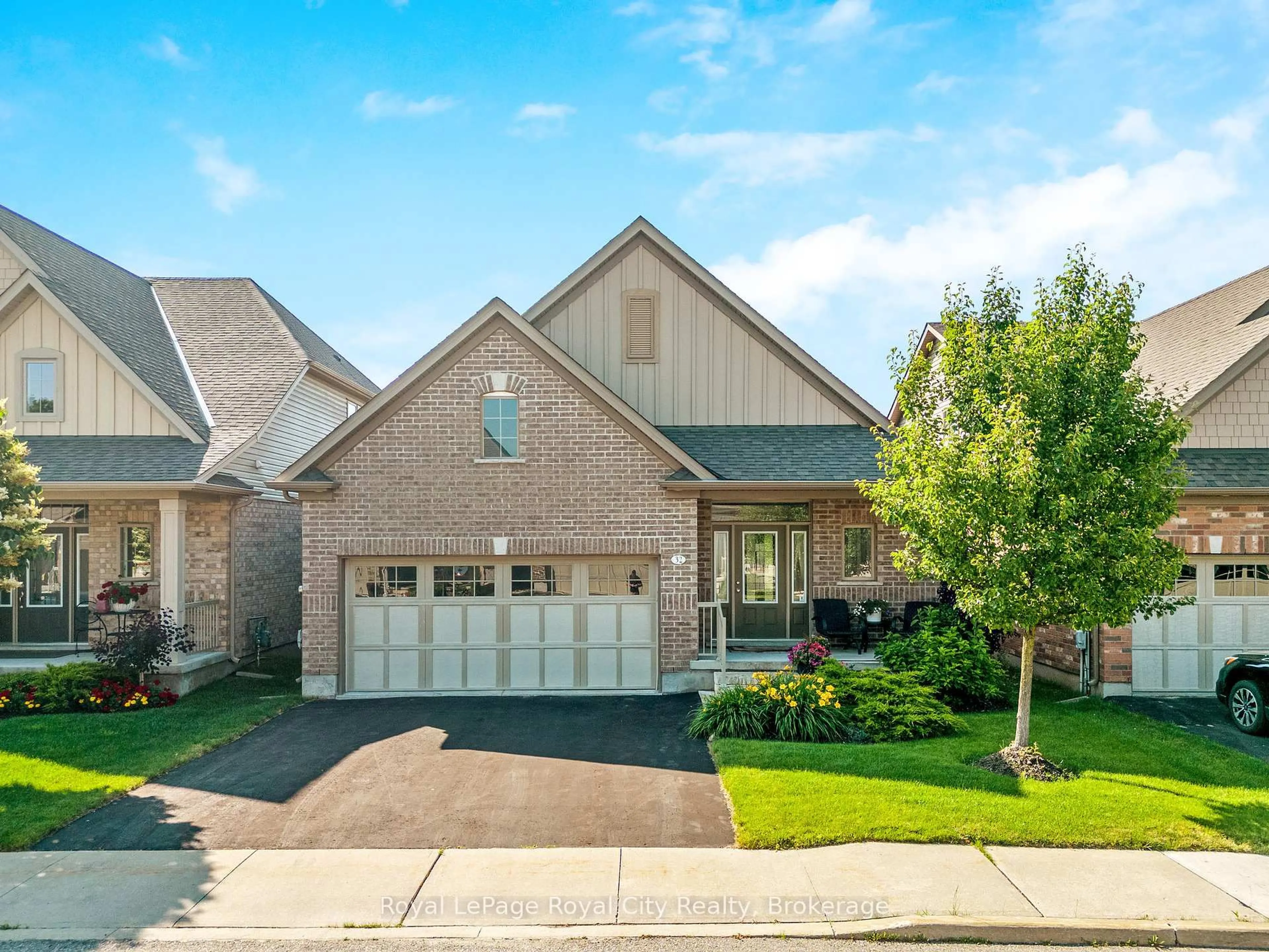 Home with brick exterior material, street for 32 Chestnut Dr, Guelph/Eramosa Ontario N0B 2K0