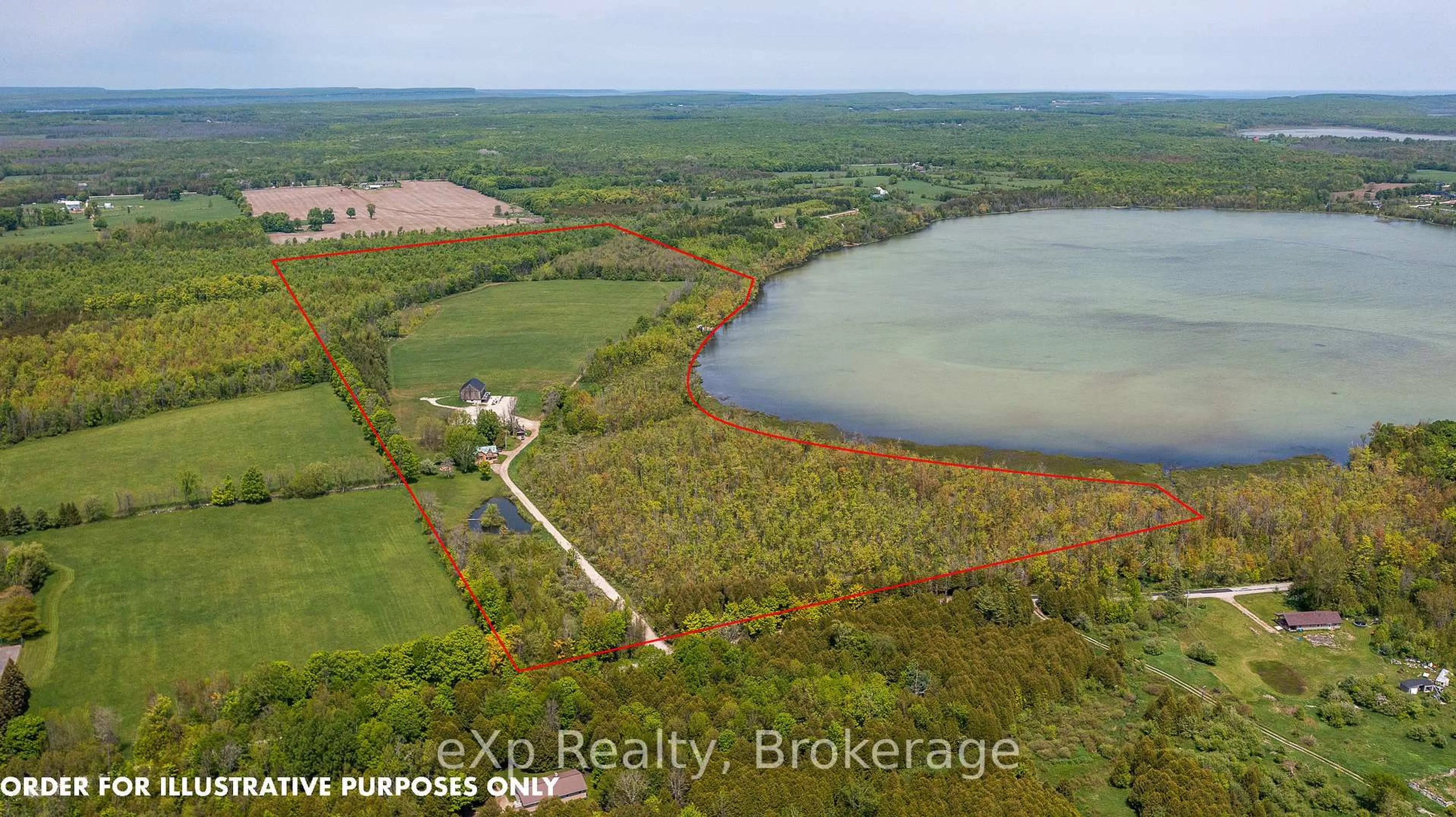 A pic from outside/outdoor area/front of a property/back of a property/a pic from drone, water/lake/river/ocean view for 382137 Concession Rd 17, Georgian Bluffs Ontario N0H 2T0