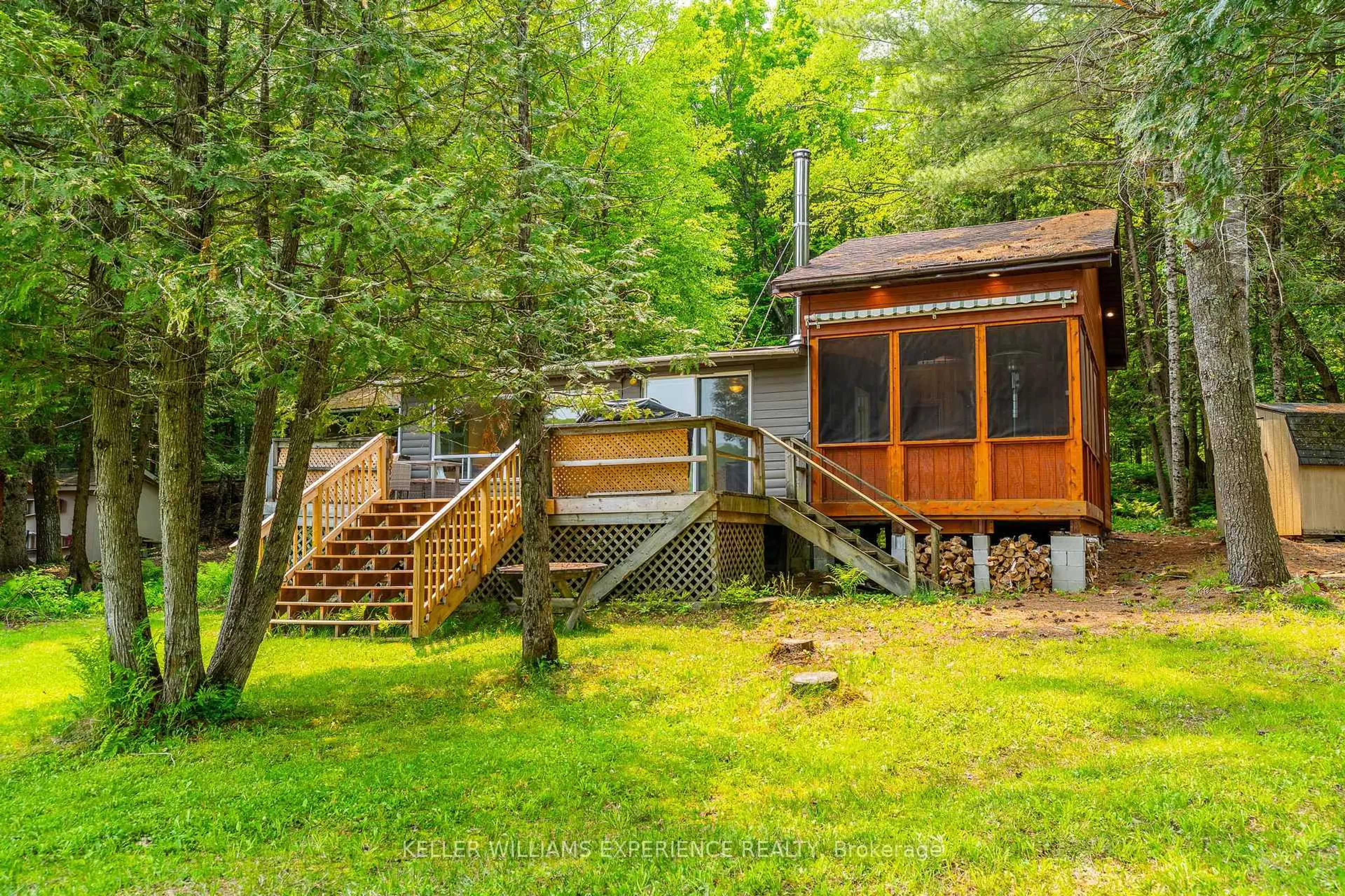 Patio, forest/trees view for 1049 ELSIE BAY Rd, Minden Hills Ontario K0M 2K0