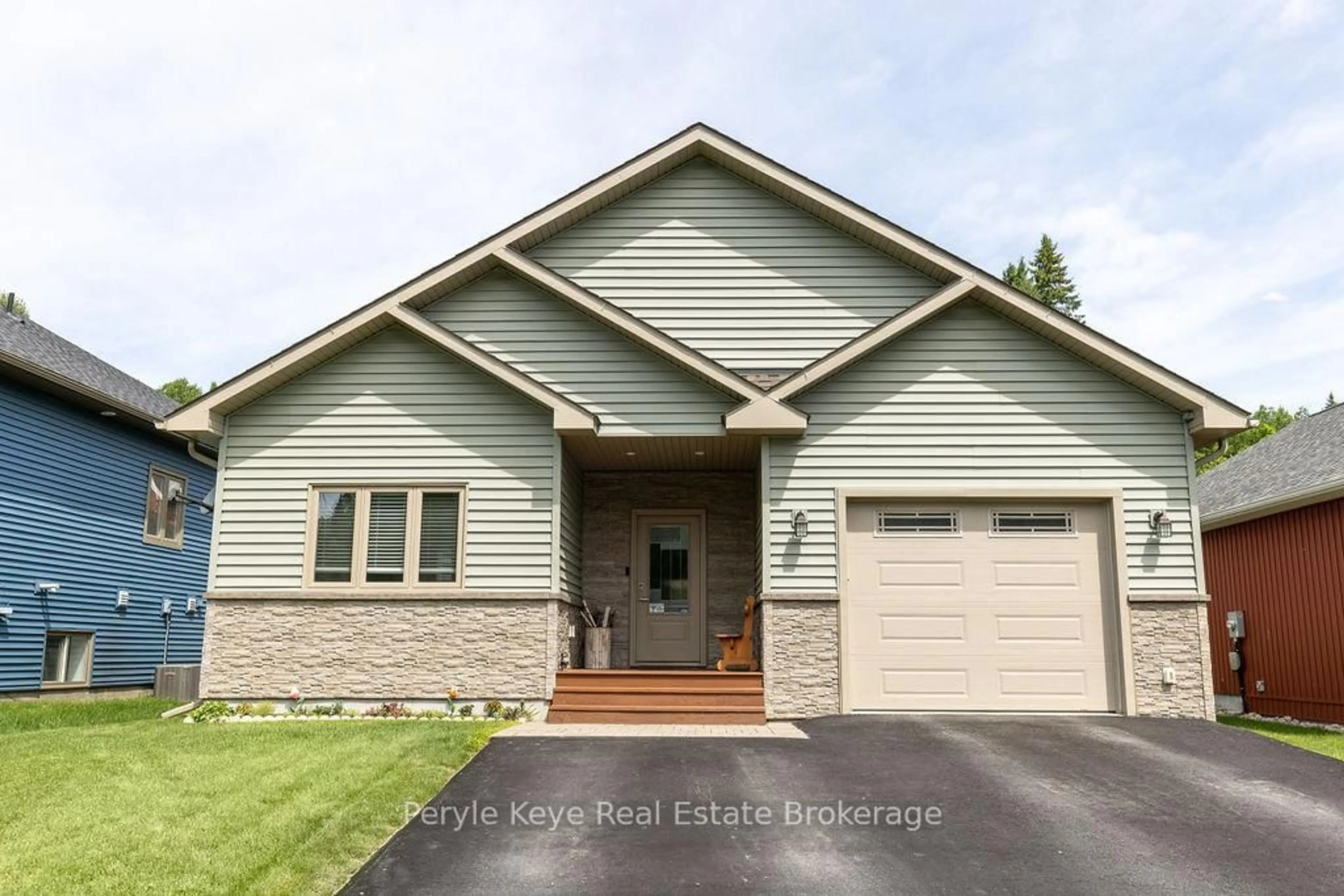 Home with vinyl exterior material, street for 86 Chaffey Township Rd, Huntsville Ontario P1H 1C8