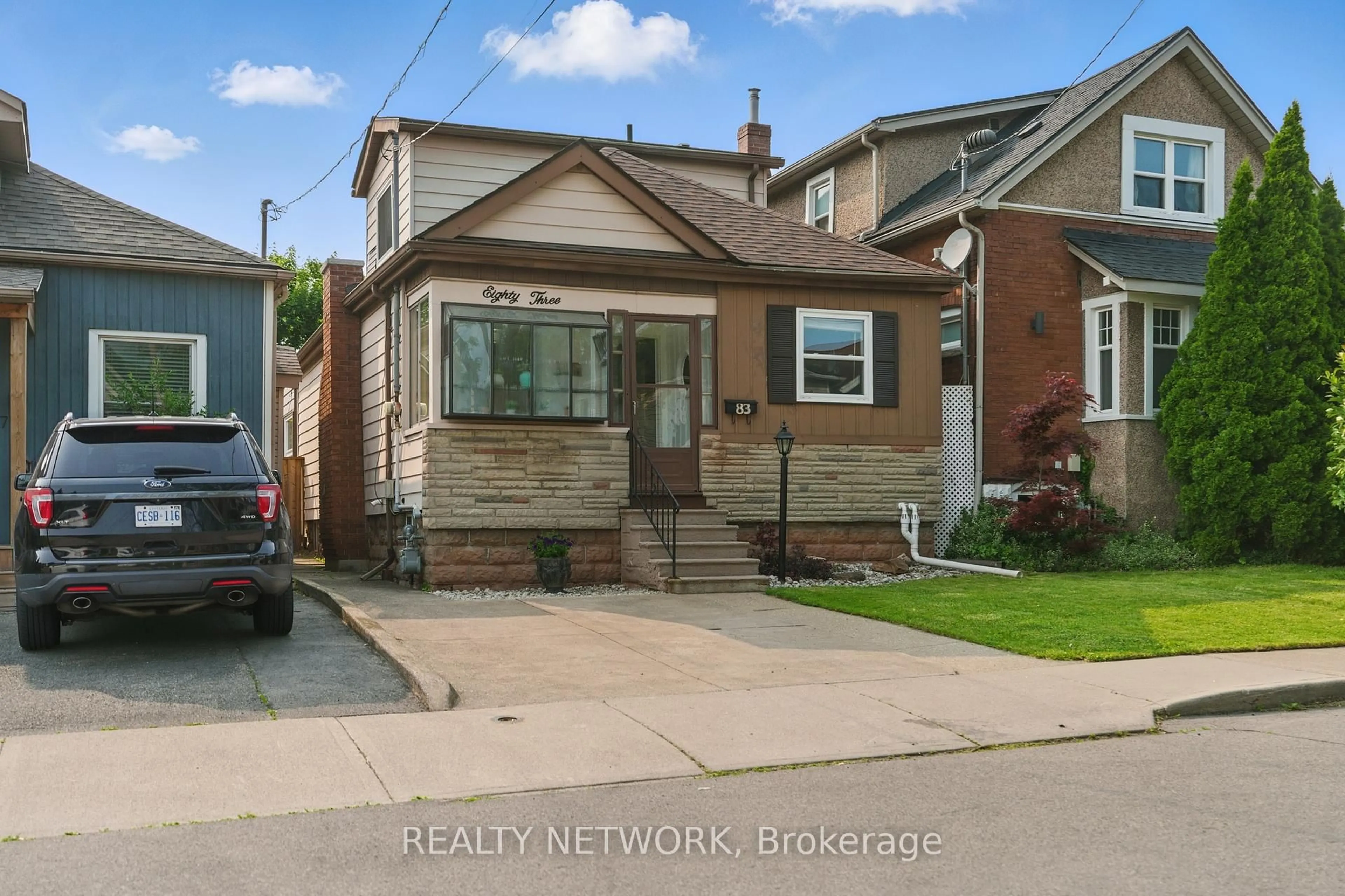 Home with brick exterior material, street for 83 Houghton Ave, Hamilton Ontario L8H 4L5