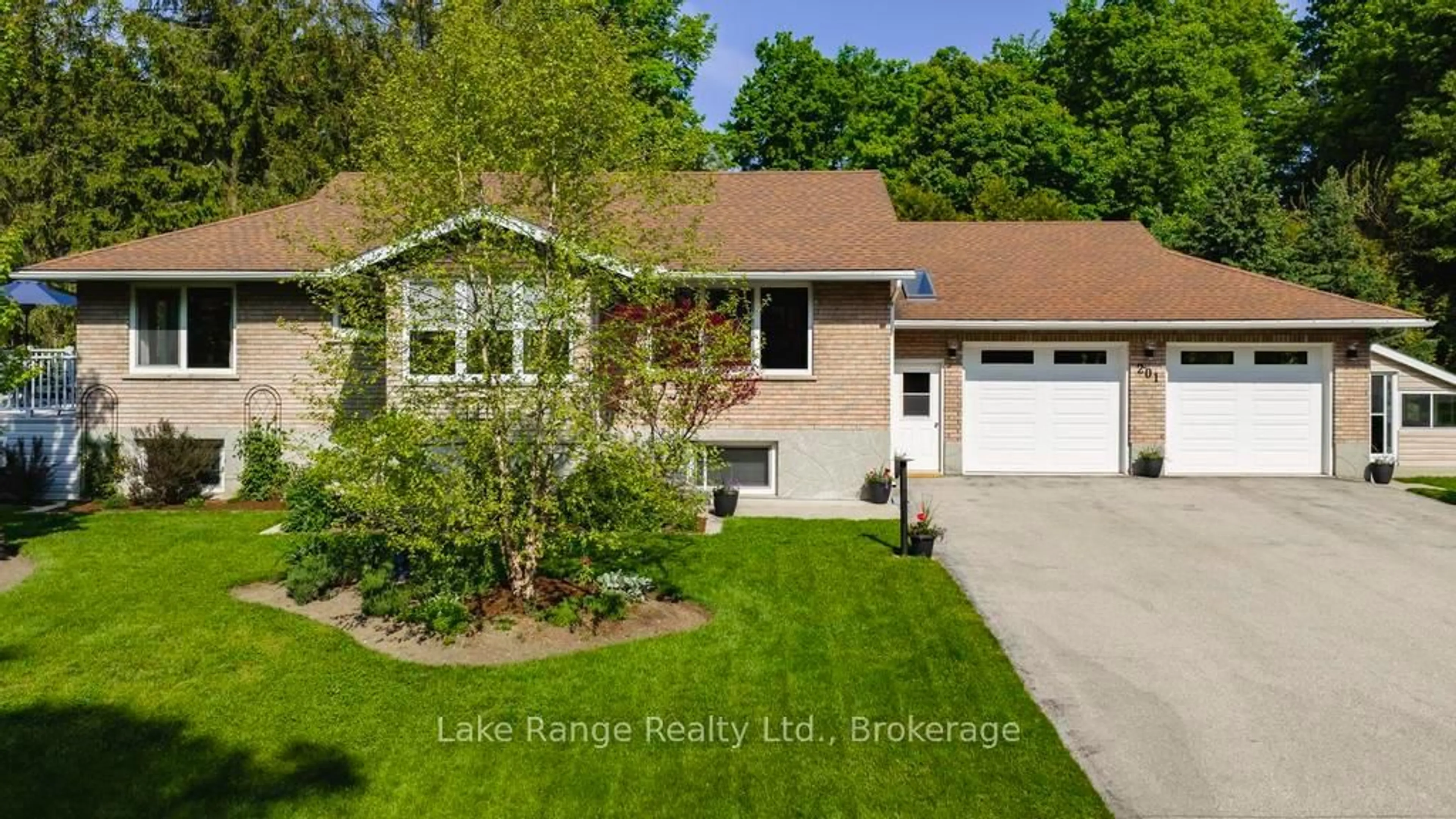 Home with vinyl exterior material, street for 201 Shadywood Cres, Huron-Kinloss Ontario N2Z 2X3