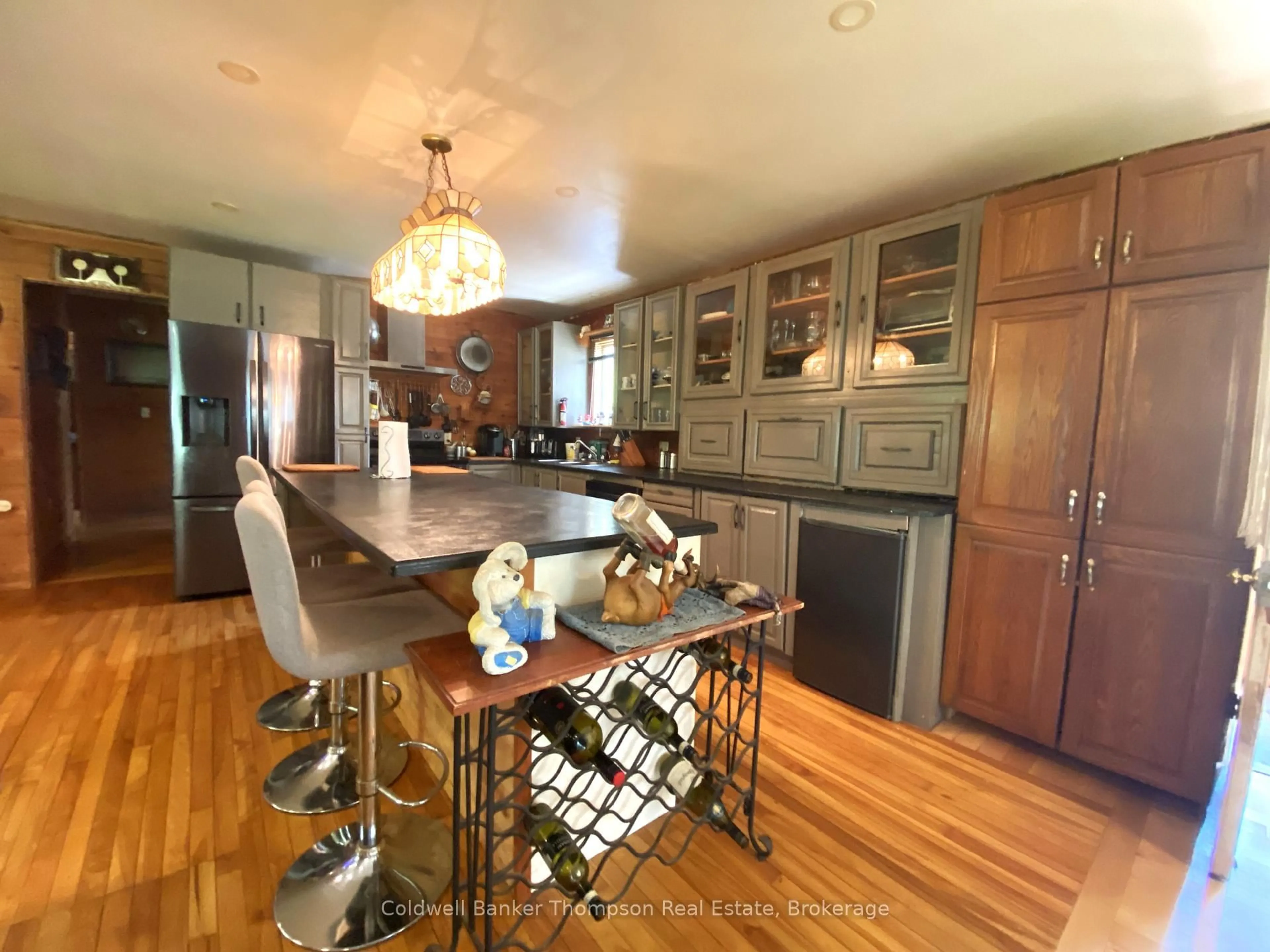 Open concept kitchen, wood/laminate floor for 83 Leighton Rd, Machar Ontario P0A 1X0