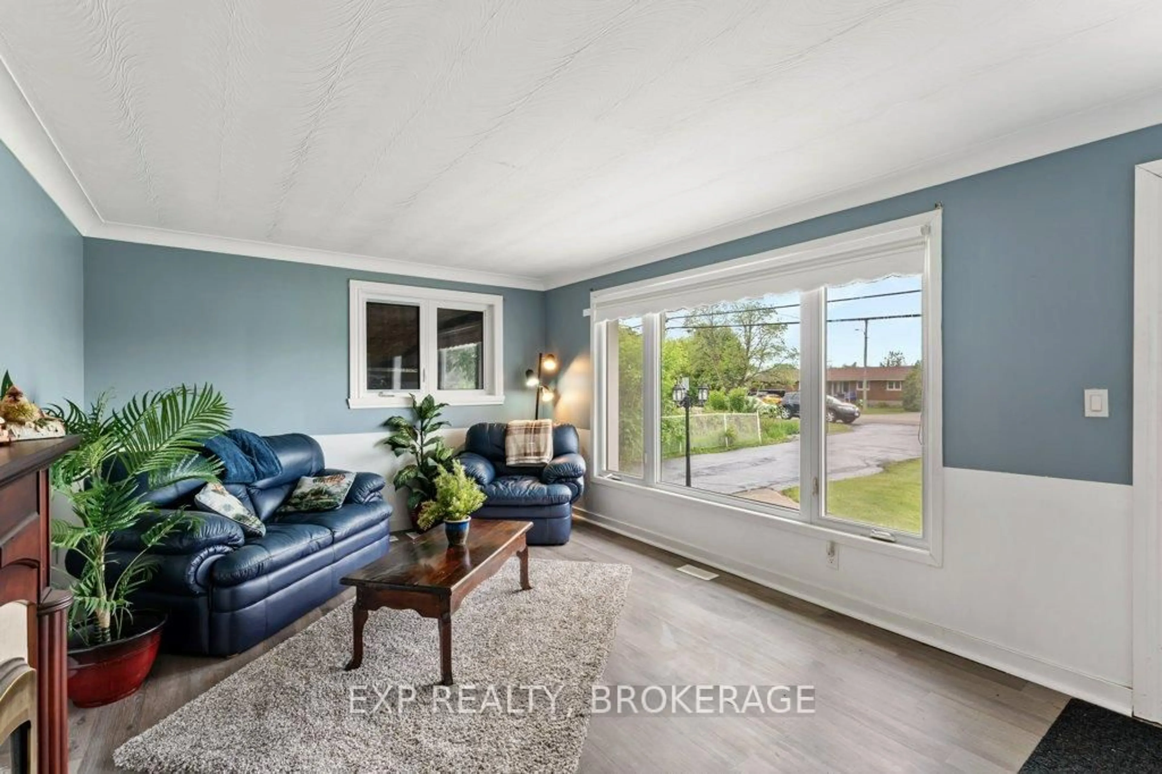 Living room with furniture, ceramic/tile floor for 5086 Highway 38, Harrowsmith Ontario K0H 1V0