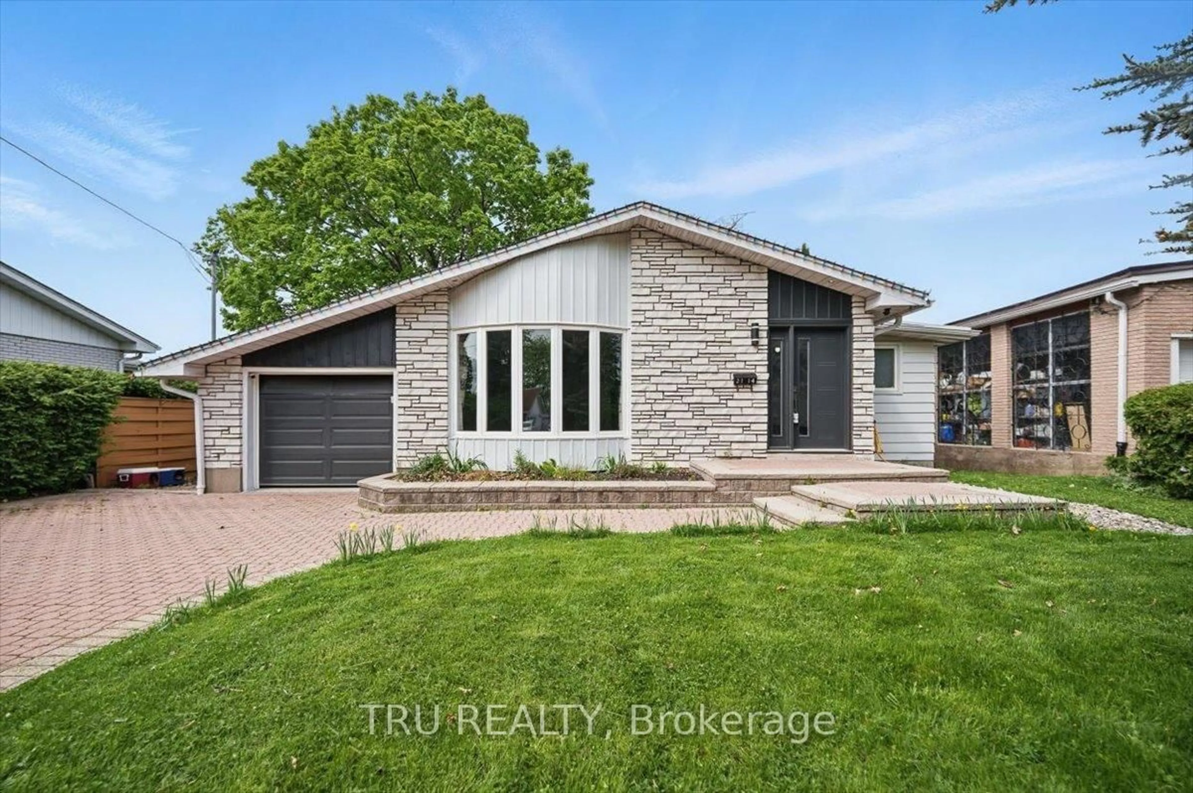 Home with brick exterior material, street for 2114 Balharrie Ave, Ottawa Ontario K1G 1G5