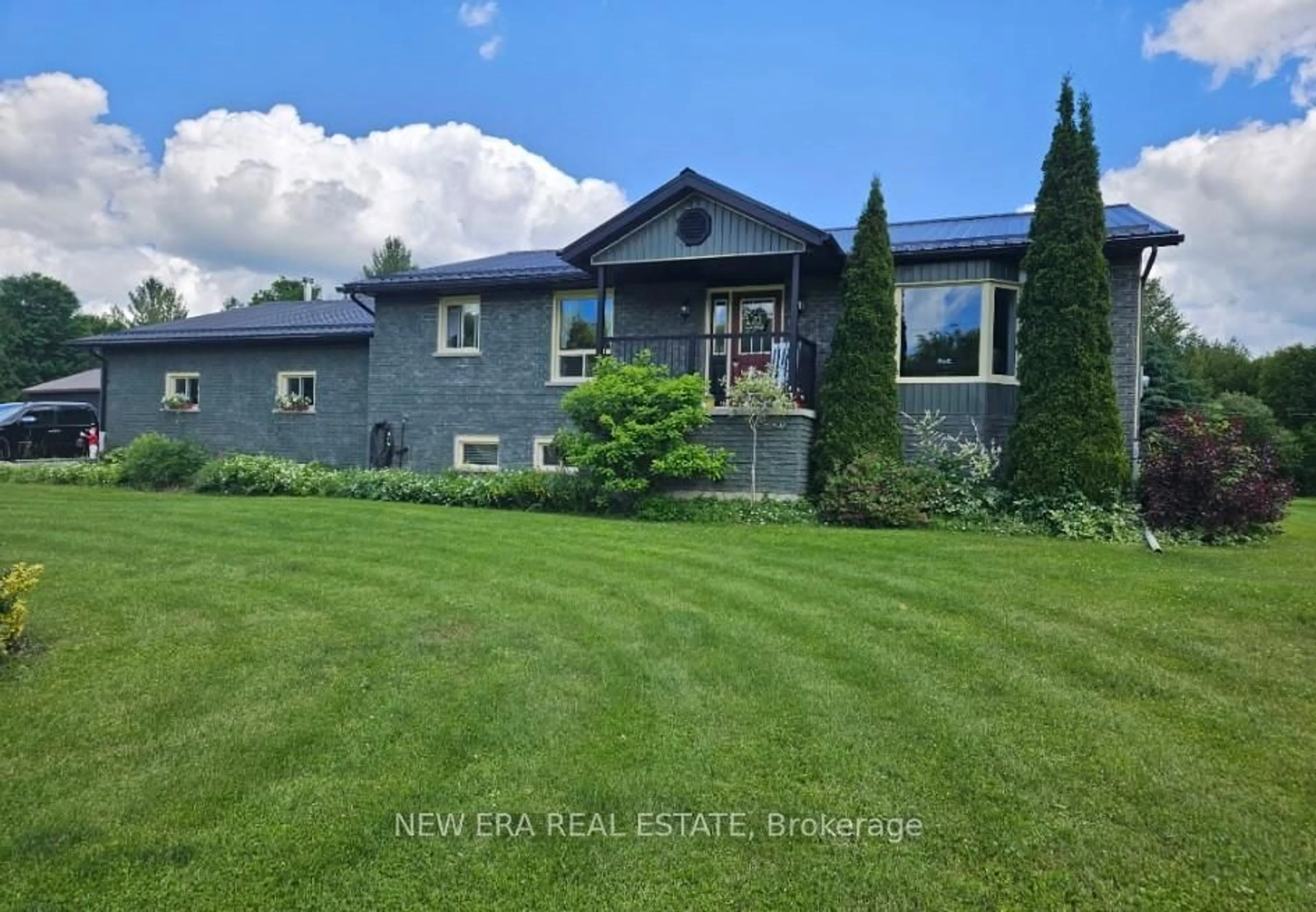 A pic from outside/outdoor area/front of a property/back of a property/a pic from drone, water/lake/river/ocean view for 443 County Rd 40, Douro-Dummer Ontario K0L 2V0
