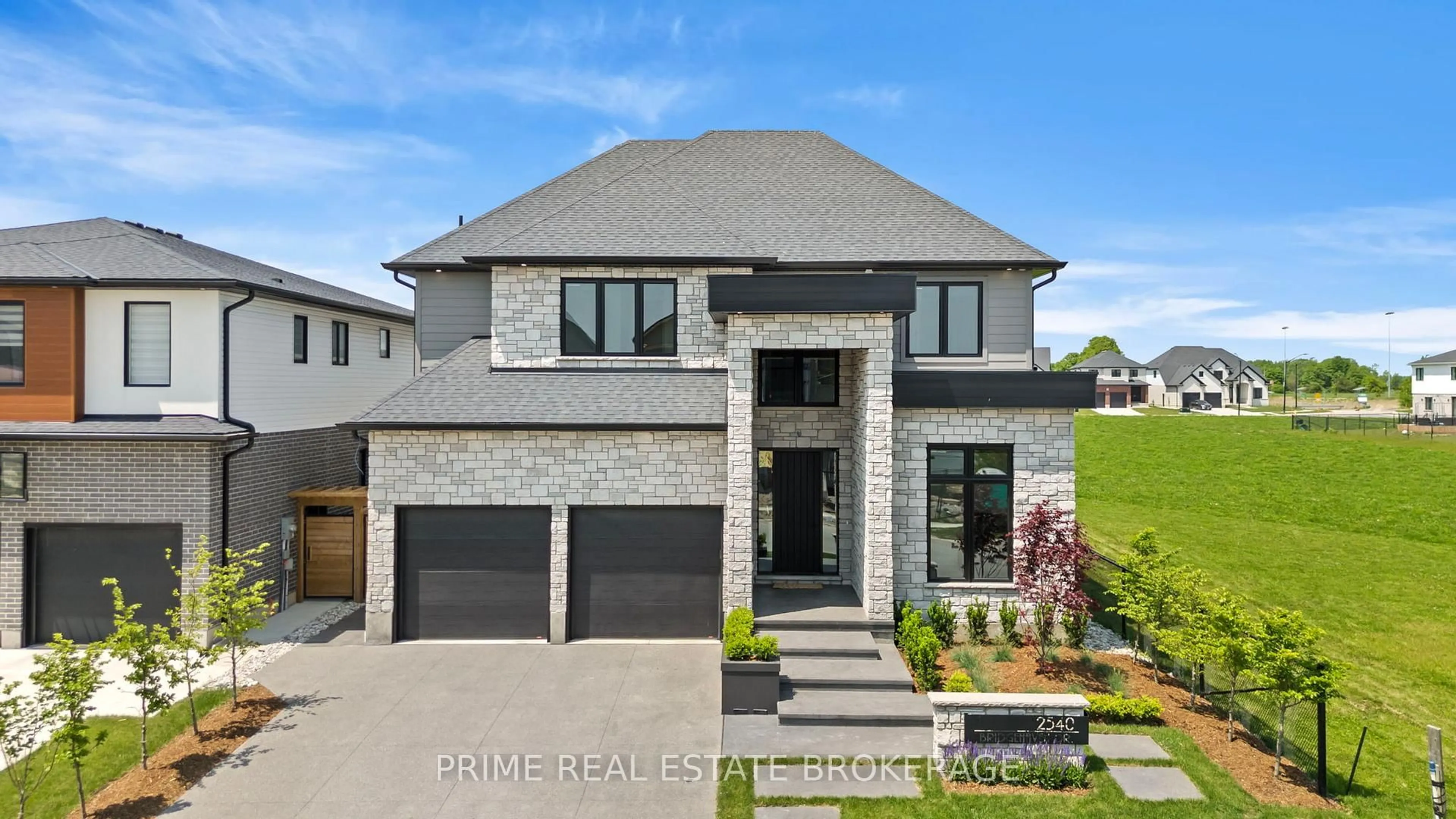 Home with brick exterior material, street for 2540 Bridgehaven Dr, London North Ontario N6G 0Z7