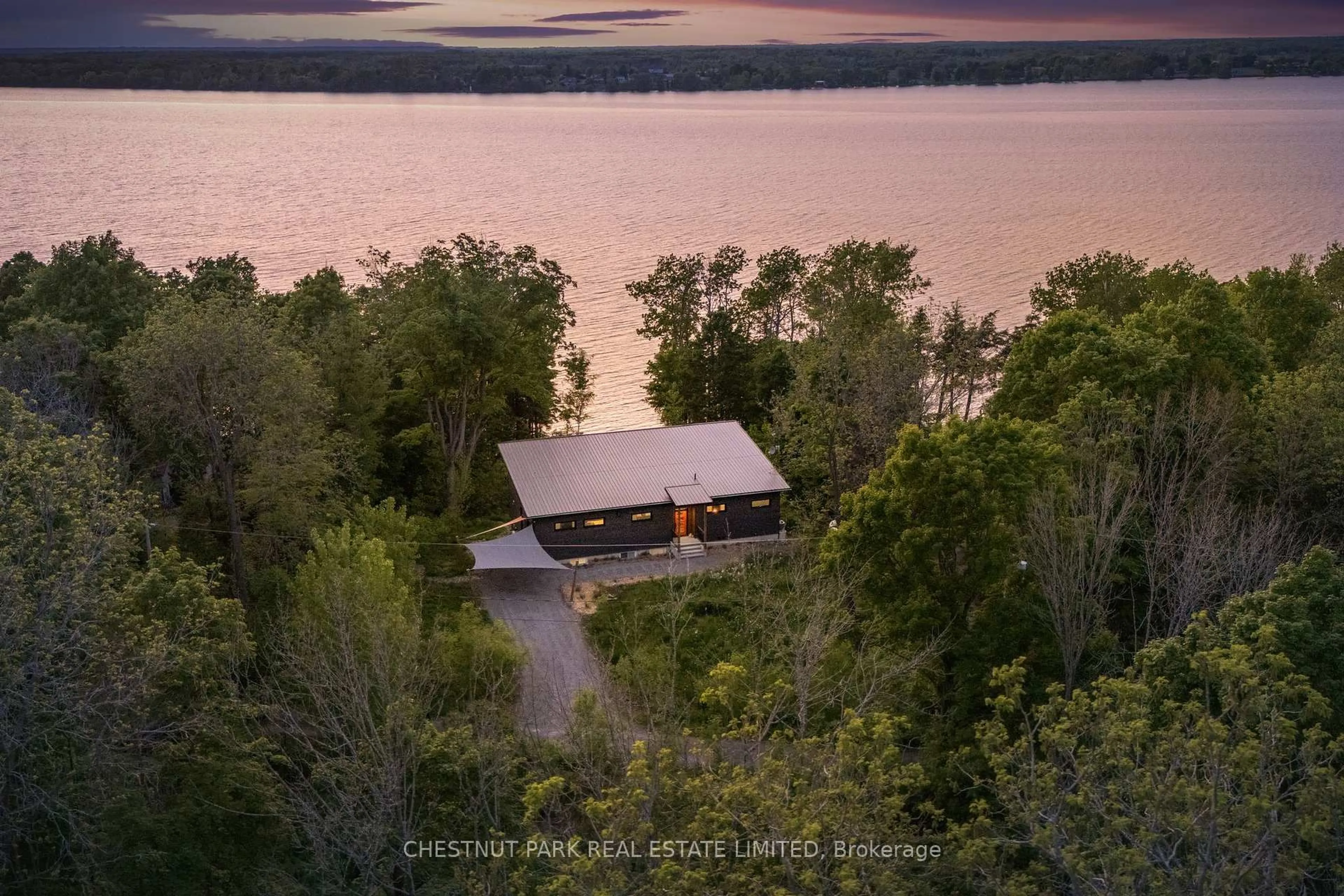 A pic from outside/outdoor area/front of a property/back of a property/a pic from drone, water/lake/river/ocean view for 39 Hicks Lane, Prince Edward County Ontario K0K 2T0