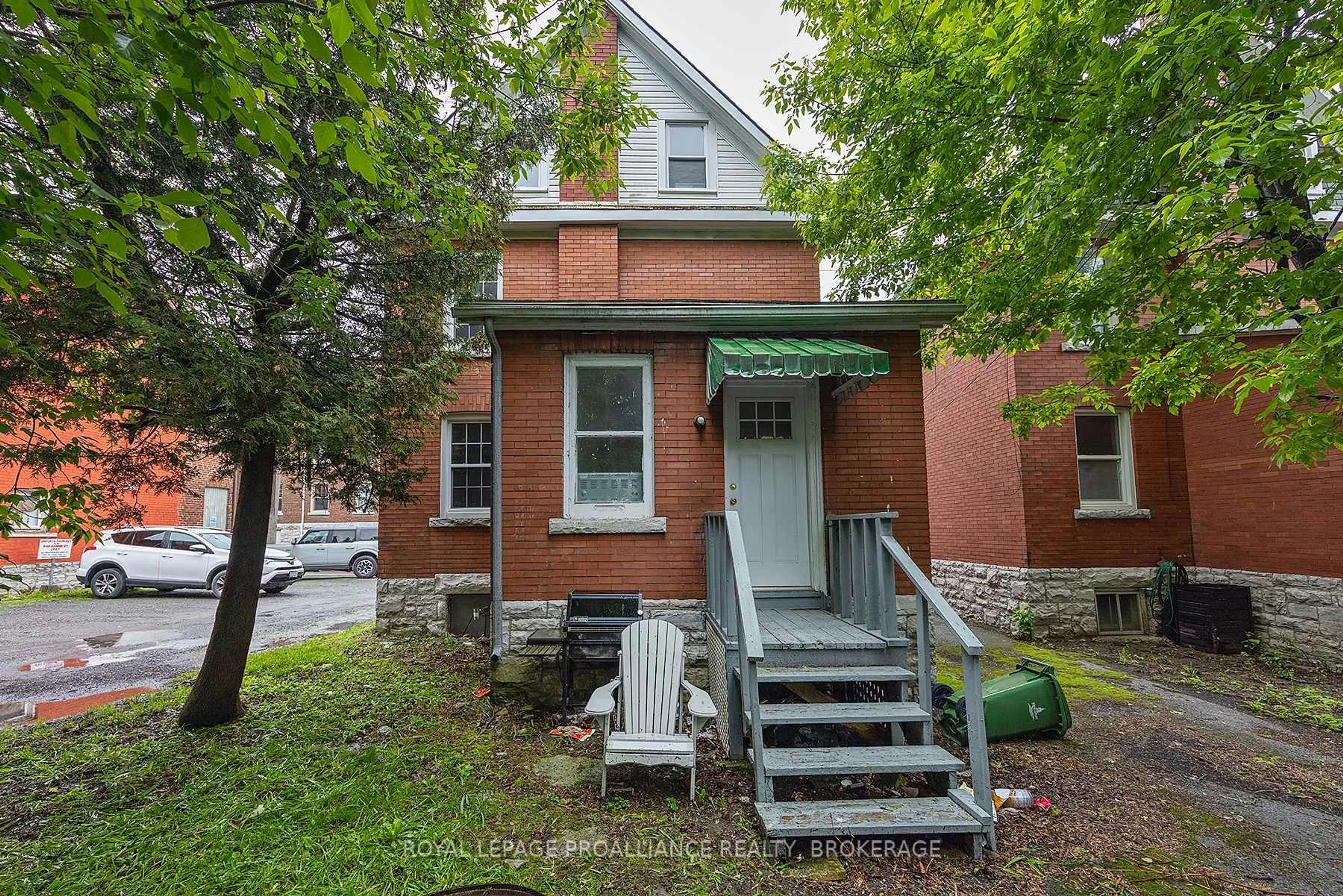 Home with brick exterior material, street for 235 William St, Kingston Ontario K7L 2E5