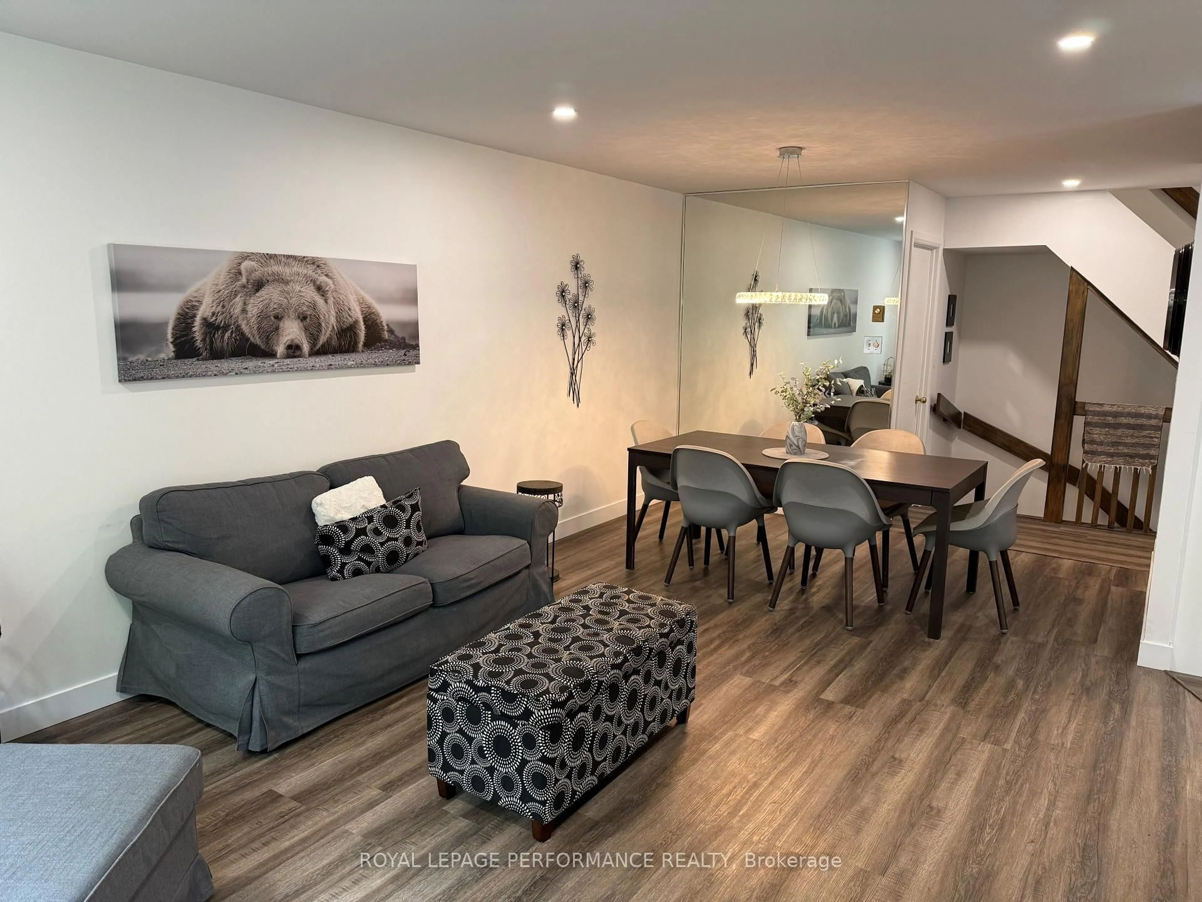 Living room with furniture, wood/laminate floor for 376 Cecile Blvd, Hawkesbury Ontario K6A 3L5