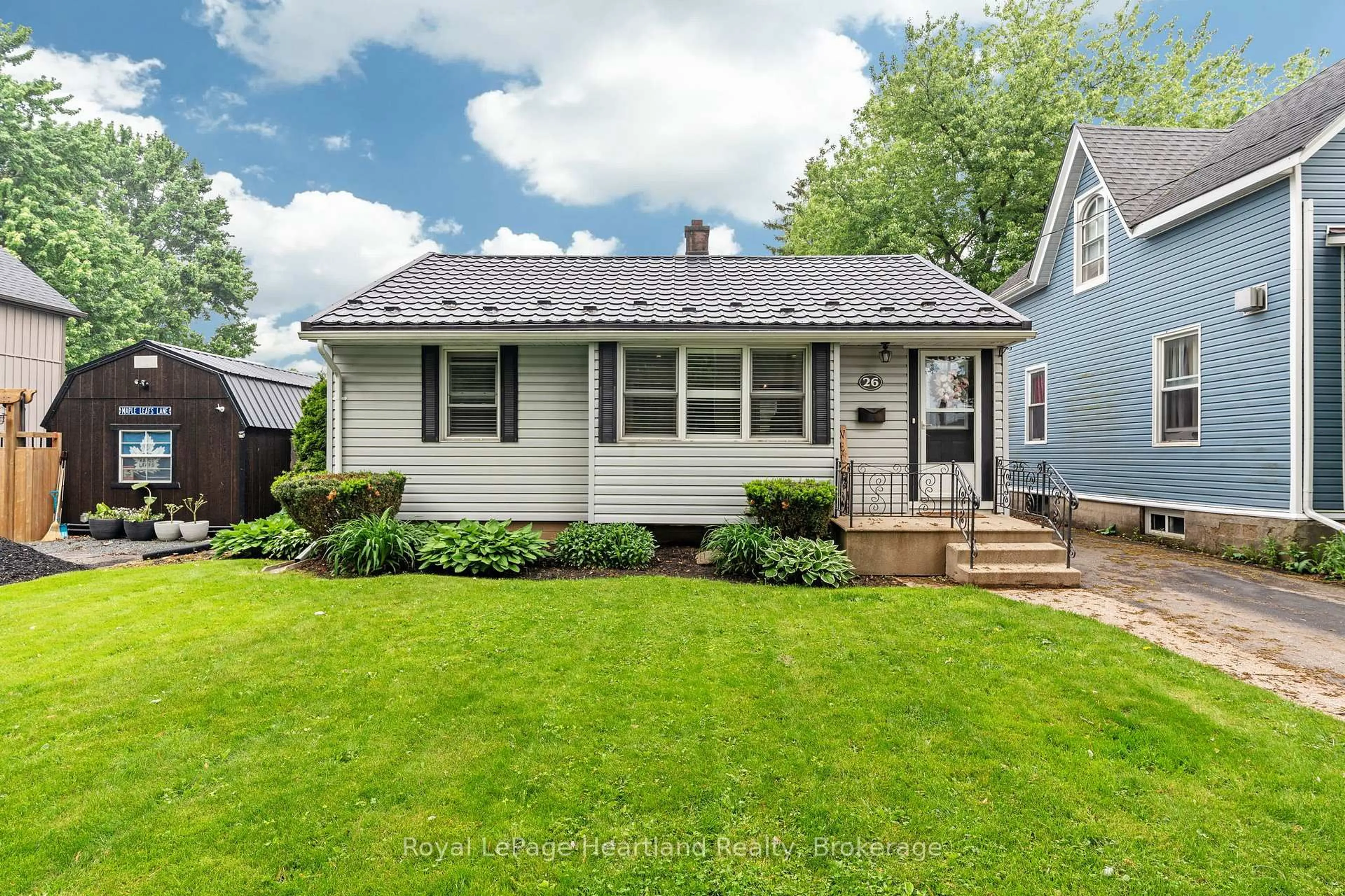 Home with vinyl exterior material, street for 26 Cherry St, Stratford Ontario N5A 2E8