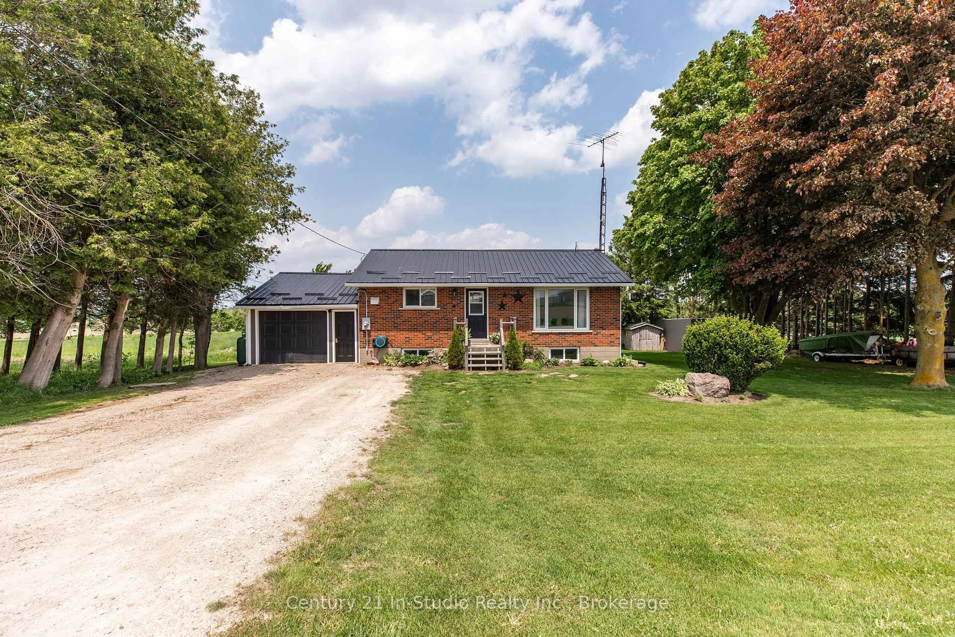 Home with brick exterior material, street for 8404 Wellington Road 15 Rd, Wellington North Ontario N0G 1N0