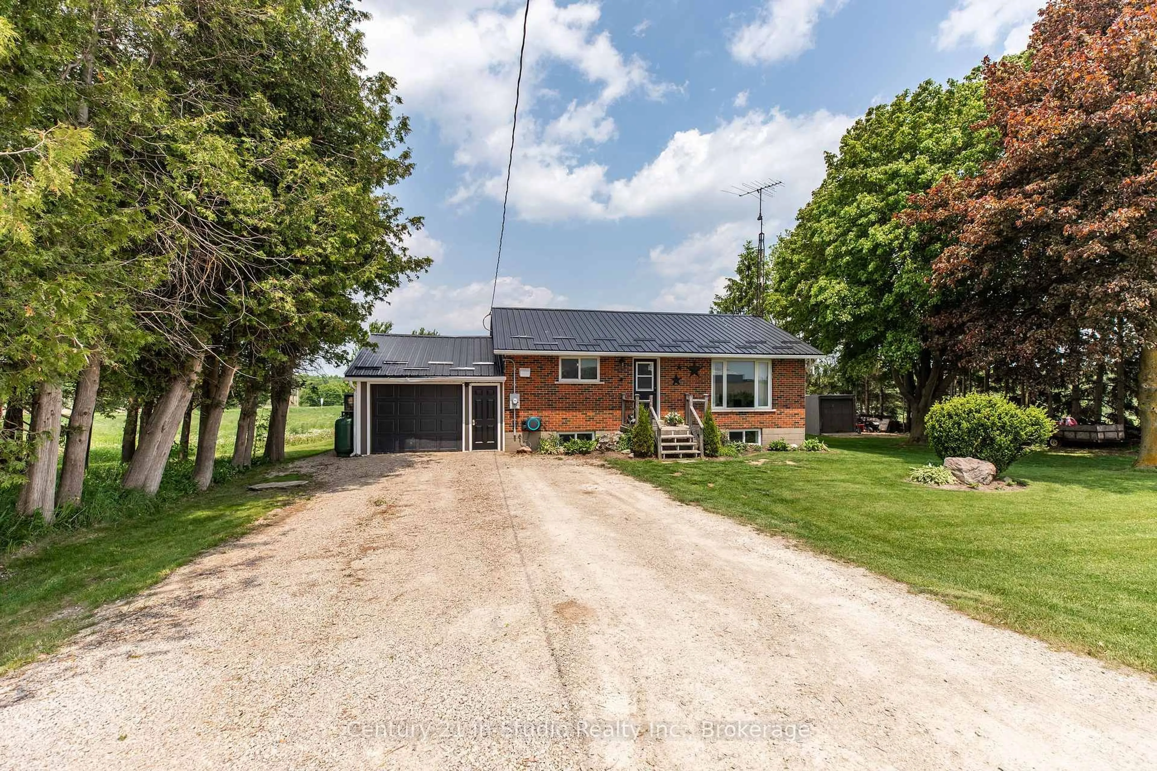 A pic from outside/outdoor area/front of a property/back of a property/a pic from drone, street for 8404 Wellington Road 15 Rd, Wellington North Ontario N0G 1N0