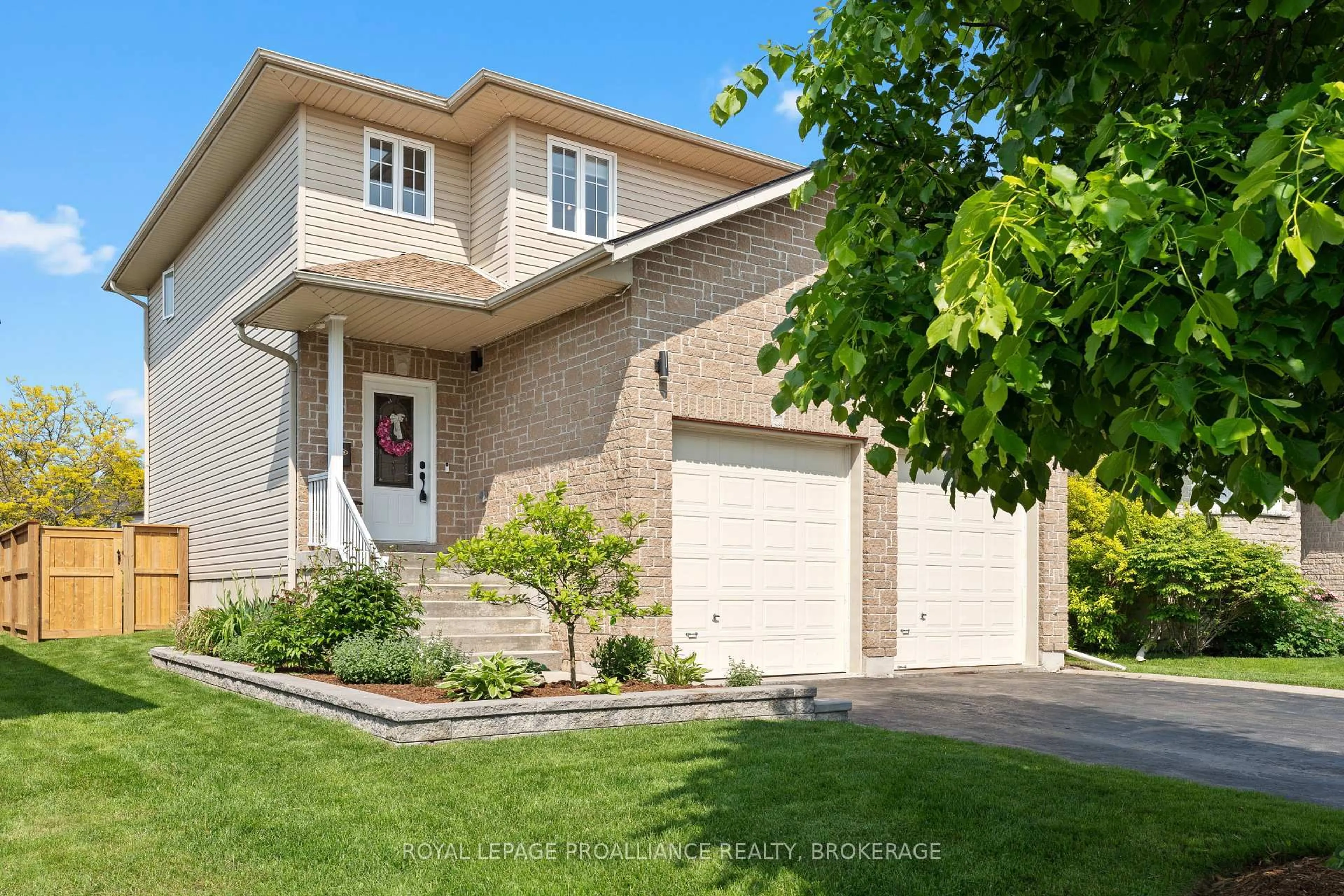 Home with brick exterior material, street for 174 Speers Blvd, Loyalist Ontario K7N 1Y7