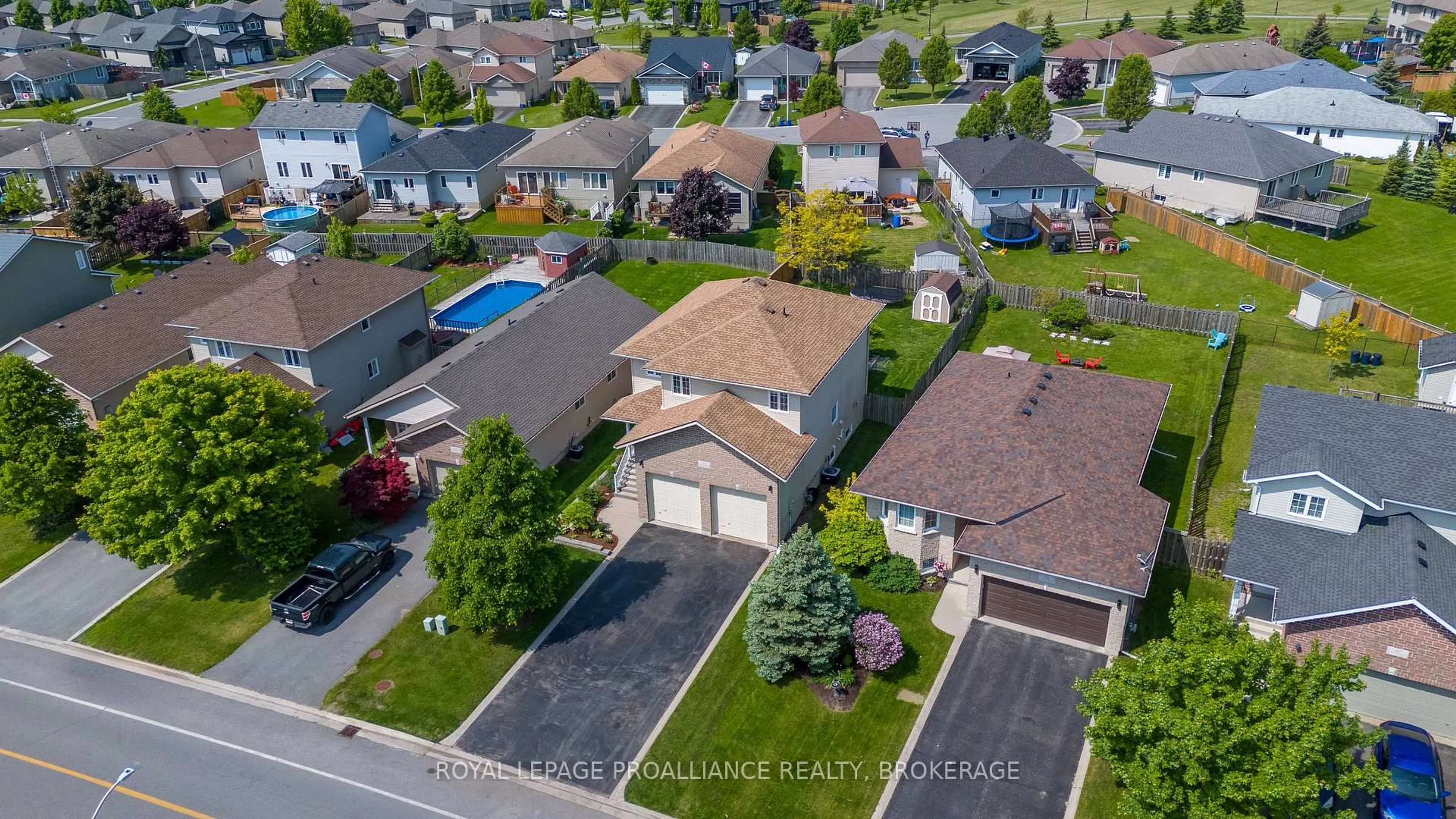 A pic from outside/outdoor area/front of a property/back of a property/a pic from drone, street for 174 Speers Blvd, Loyalist Ontario K7N 1Y7